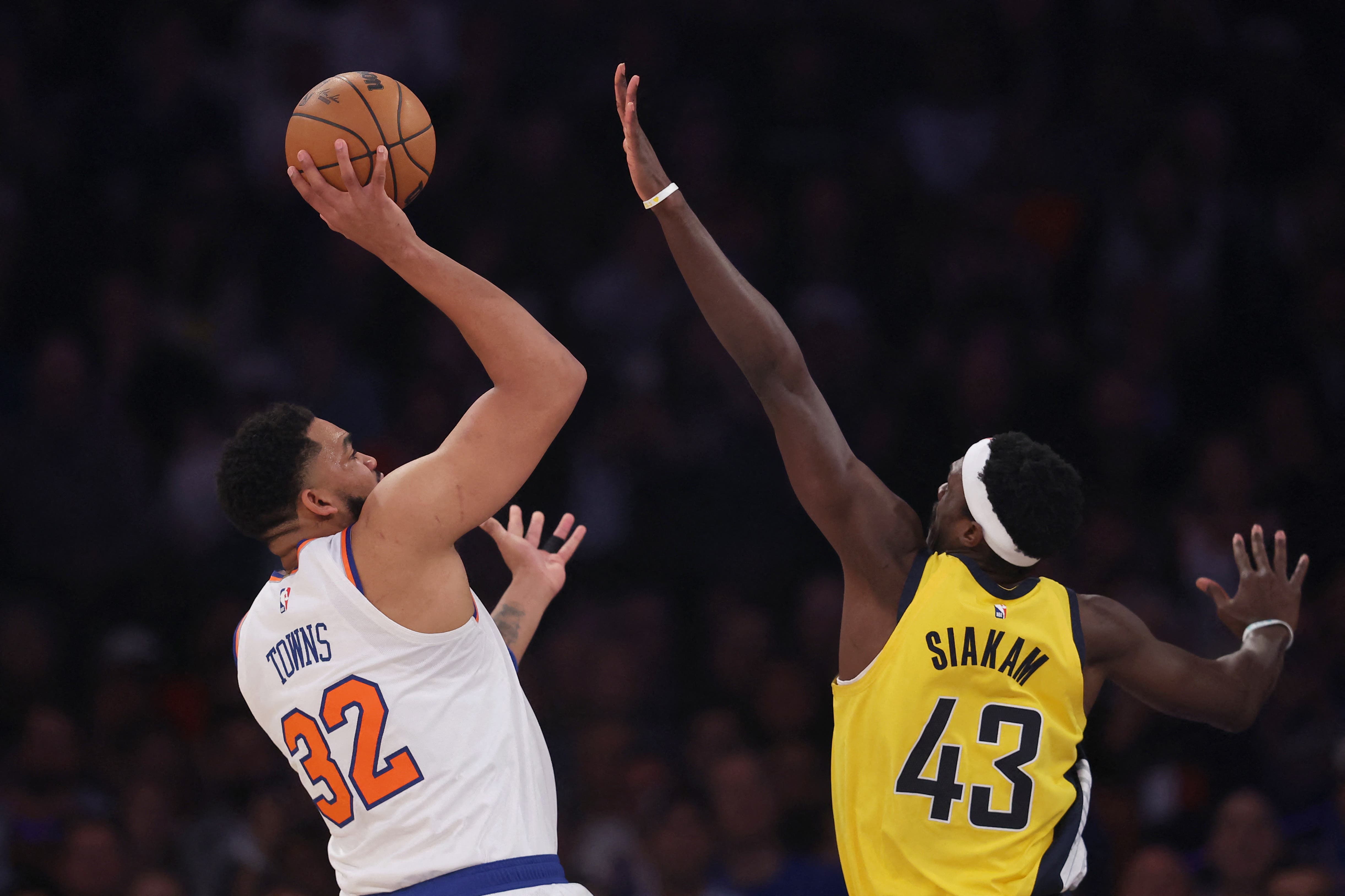 New York Knicks' Karl-Anthony Towns and Indiana Pacers' Pascal Siakam in Game 5.