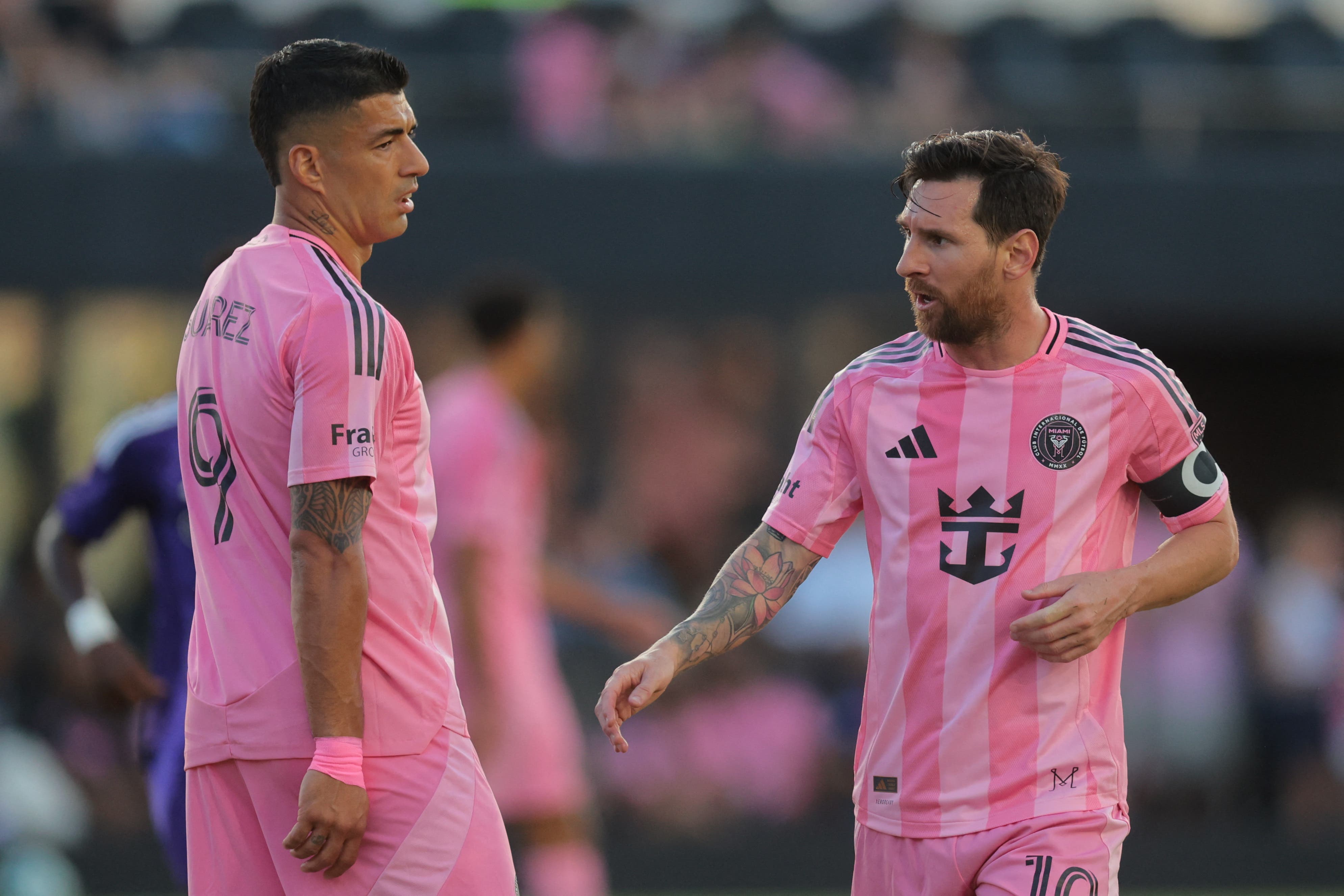 May 18, 2025; Fort Lauderdale, Florida, USA; Inter Miami CF forward Lionel Messi (10) talks to forward Luis Suarez (9) against Orlando City during the first half at Chase Stadium. Mandatory Credit: Sam Navarro-Imagn Images