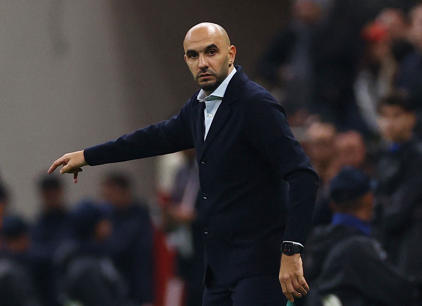 Soccer Football - CAF Africa Cup of Nations - Morocco 2025 - Quarter Final - Morocco v Cameroon - Prince Moulay Abdellah Stadium, Rabat, Morocco - January 9, 2026 Morocco coach Walid Regragui reacts REUTERS/Siphiwe Sibeko