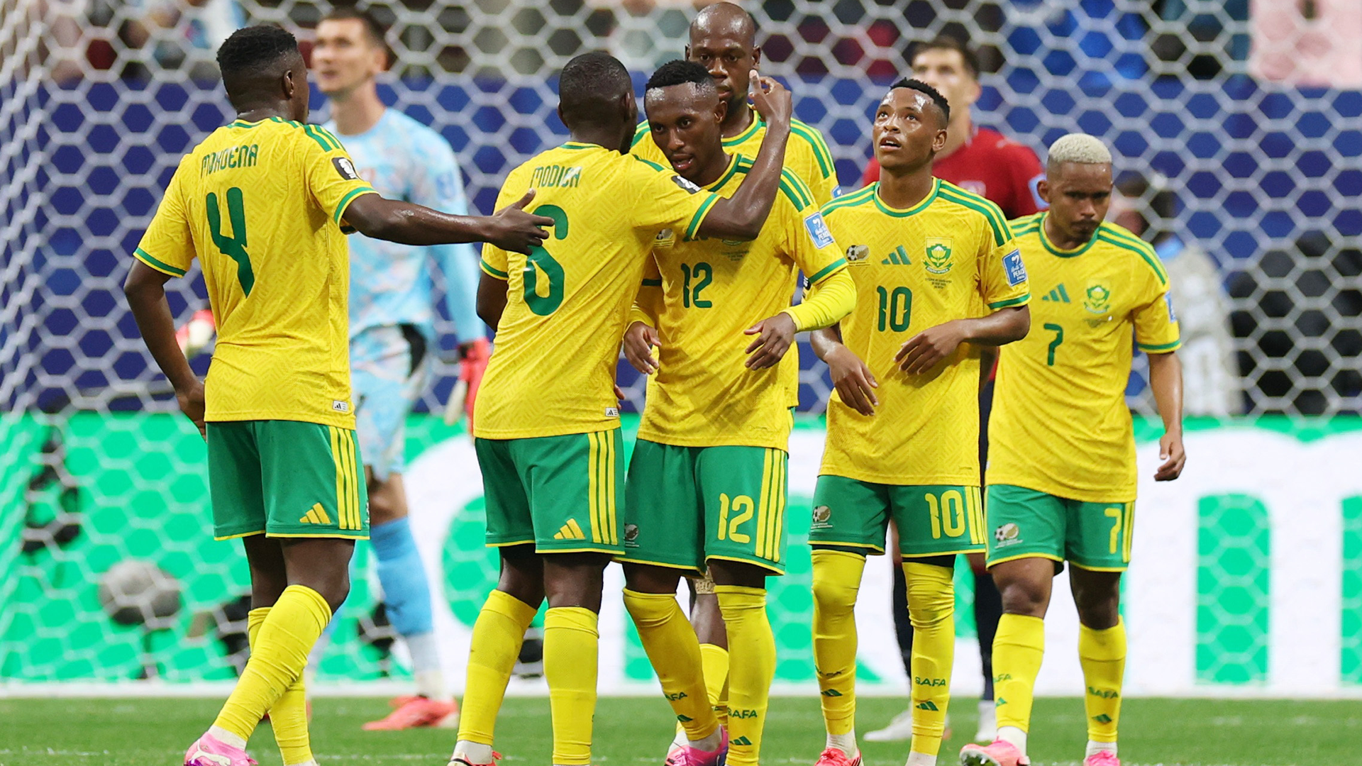 Soccer Football - FIFA World Cup 2026 - Group A - Czech Republic v South Africa - Atlanta Stadium, Atlanta, Georgia, U.S. - June 18, 2026 talks to South Africa's Thapelo Maseko celebrates with teammates after they are awarded a penalty for a handball by Czech Republic's Pavel Sulc REUTERS/Siphiwe Sibeko