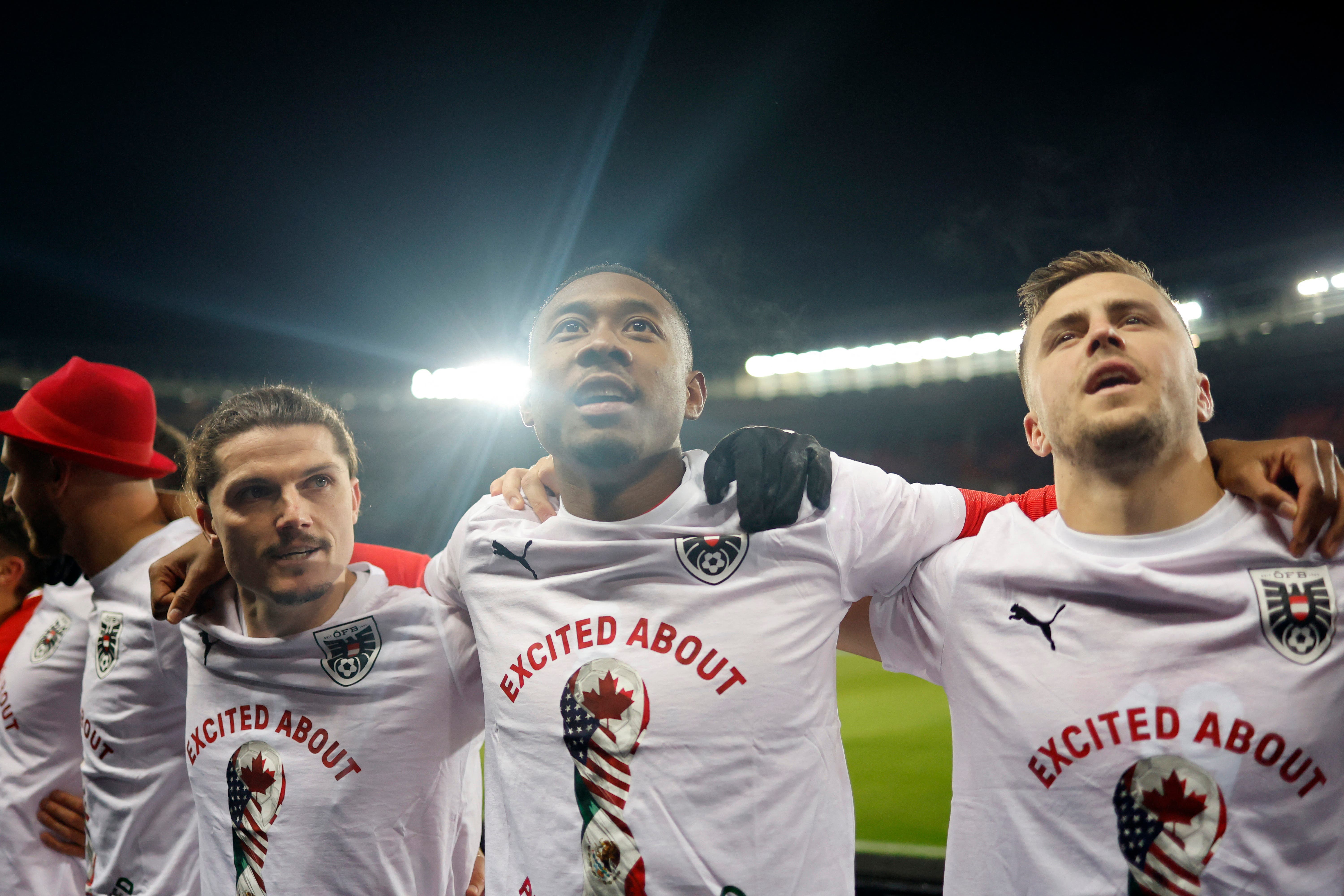 Soccer Football - FIFA World Cup - UEFA Qualifiers - Group H - Austria v Bosnia and Herzegovina - Ernst-Happel-Stadion, Vienna, Austria - November 18, 2025 Austria's Marcel Sabitzer and David Alaba celebrate after winning their group to qualify for the World Cup finals REUTERS/Lisa Leutner