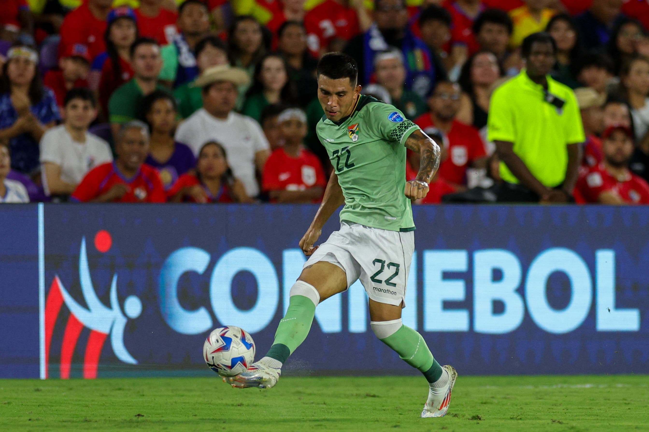 Jul 1, 2024; Orlando, FL, USA; Bolivia defender Hector Cuellar (22) passes the ball against Panama in the first half during a Copa America group stage match at Inter&CO Stadium. Mandatory Credit: Nathan Ray Seebeck-USA TODAY Sports
