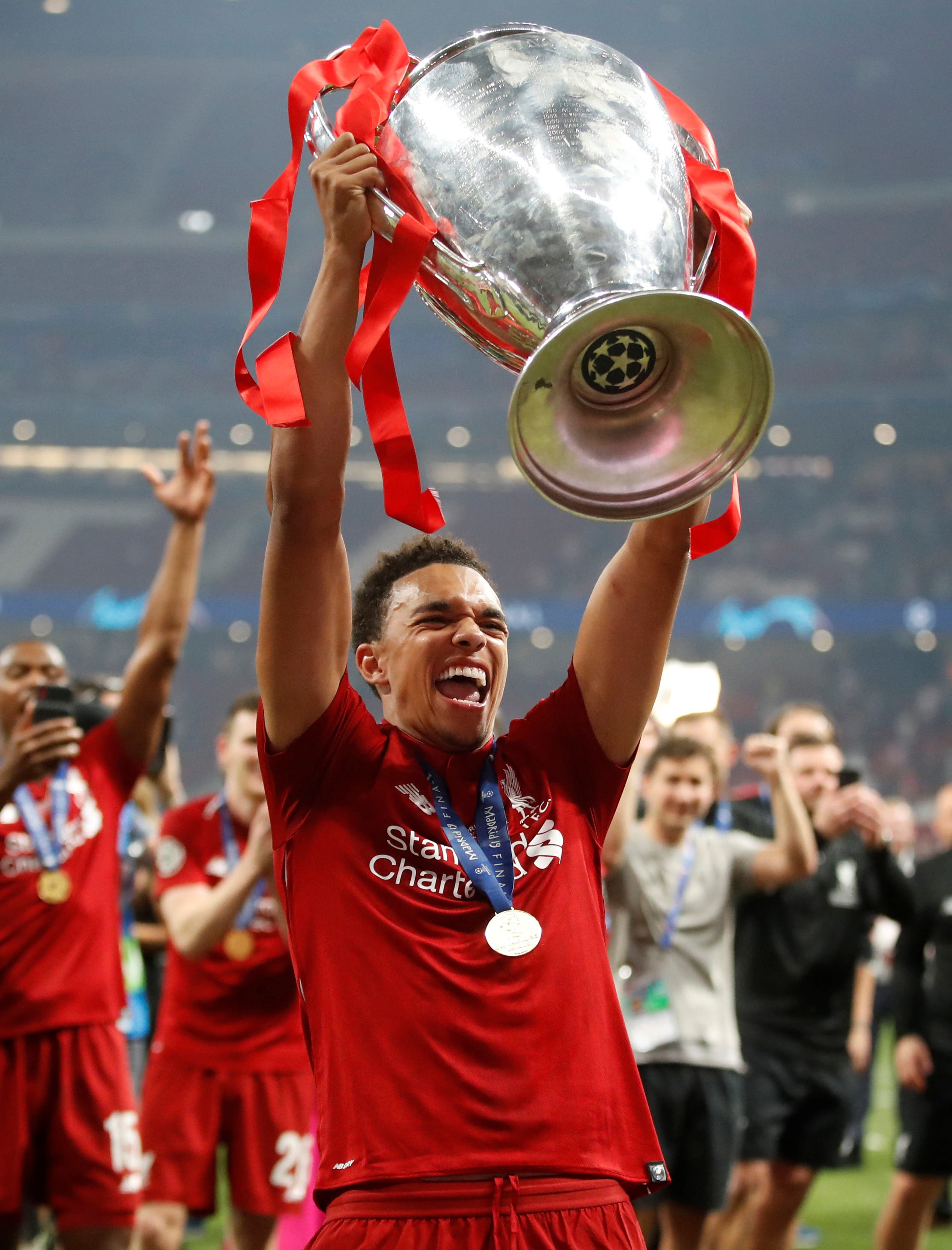  Liverpool's Trent Alexander-Arnold celebrates with the trophy after winning the Champions League Final 