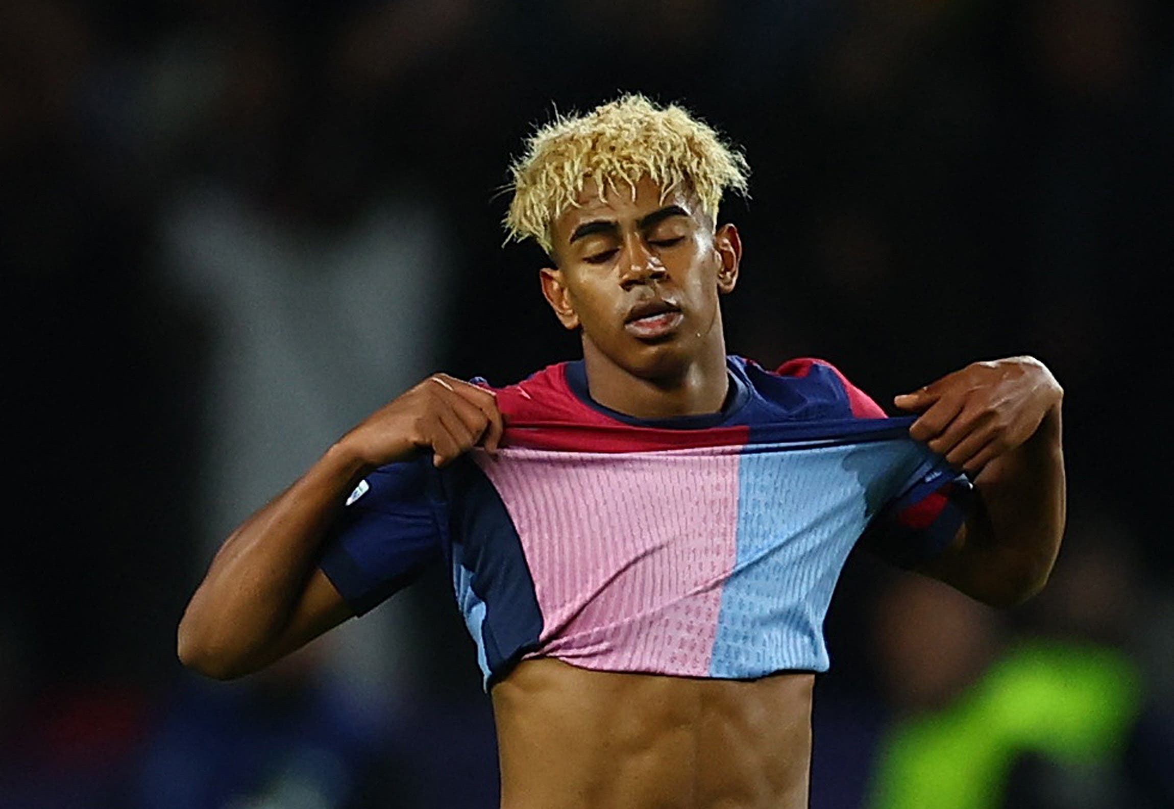 FC Barcelona's Lamine Yamal reacts after the match 