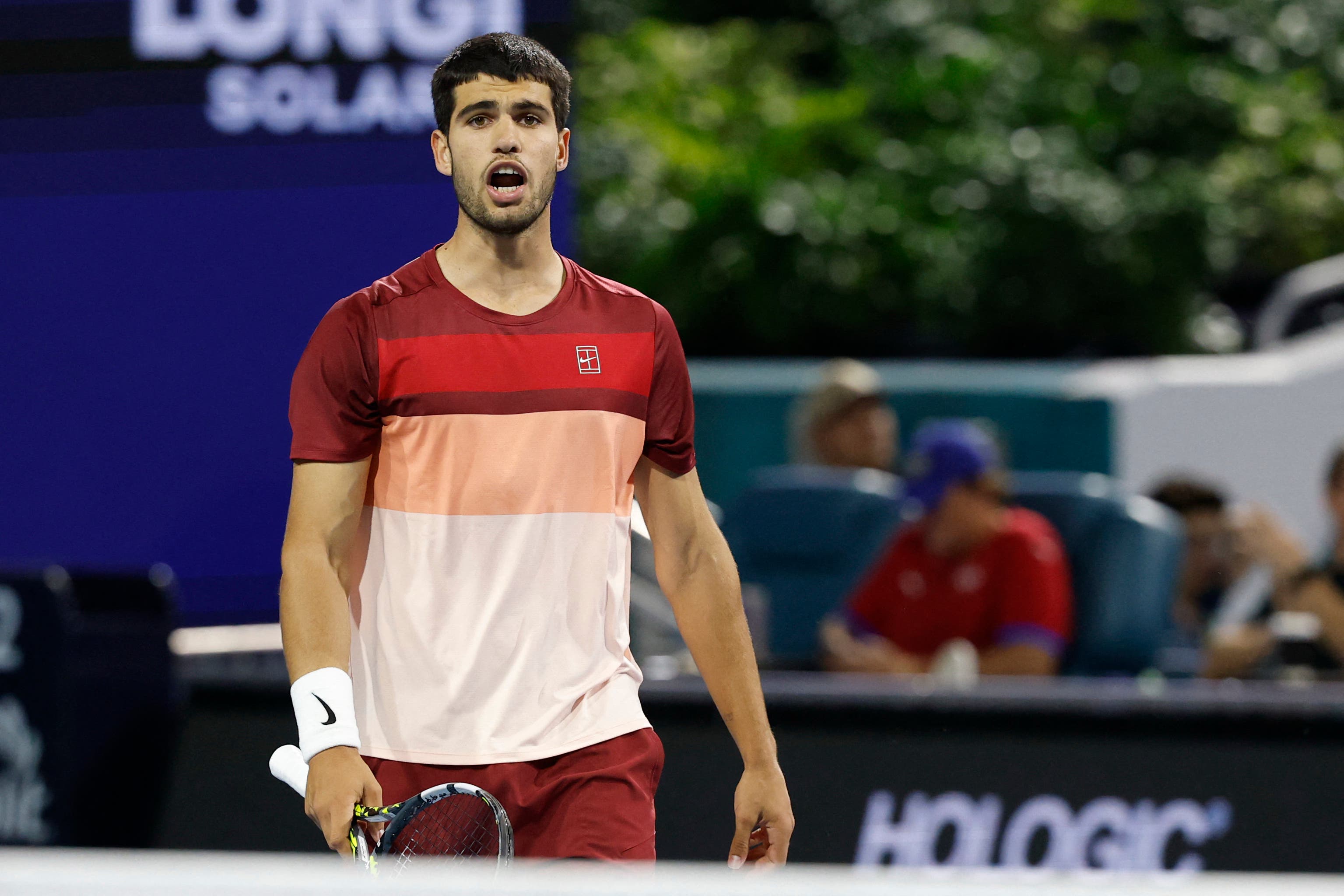 Mar 21, 2025; Miami, FL, USA; Carlos Alcaraz (ESP) talks to his box between points against David Goffin (BEL)(not pictured) on day four of the Miami Open at Hard Rock Stadium. Mandatory Credit: Geoff Burke-Imagn Images