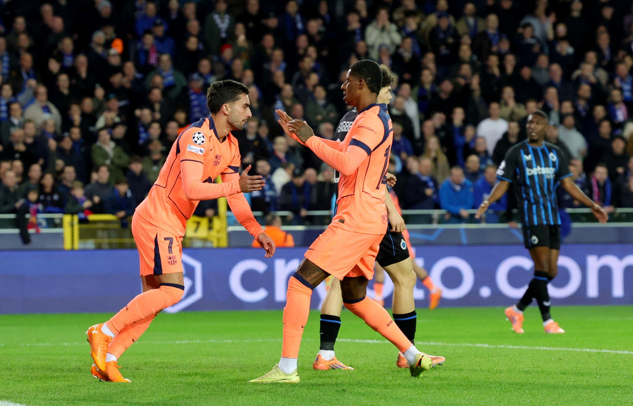 Soccer Football - UEFA Champions League - Club Brugge v FC Barcelona - Jan Breydel Stadium, Bruges, Belgium - November 5, 2025 FC Barcelona's Ferran Torres celebrates scoring their first goal with Marcus Rashford REUTERS/Yves Herman
