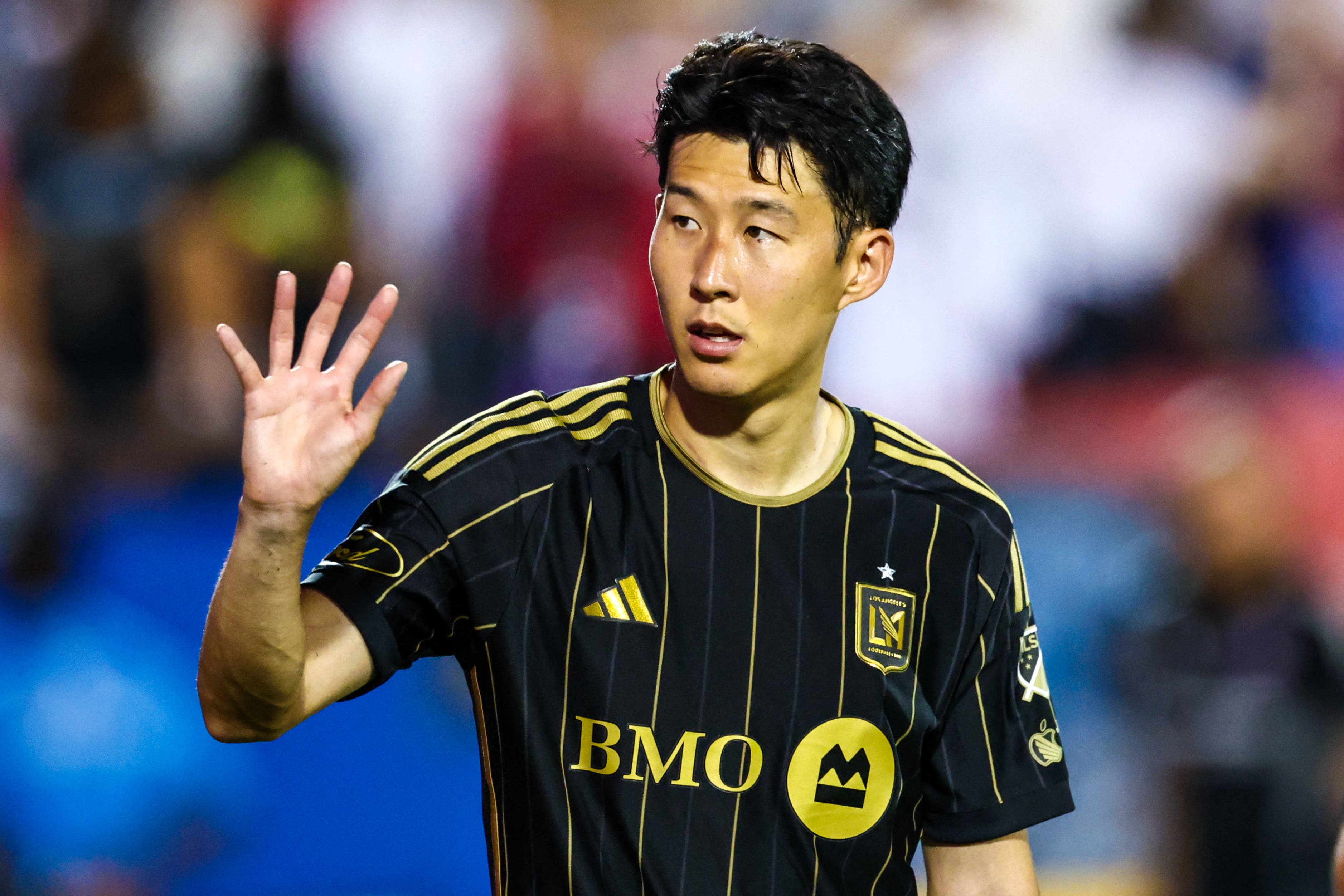 Aug 23, 2025; Frisco, Texas, USA; Los Angeles FC forward Son Heung-Min (7) waves to fans after the game against FC Dallas at Toyota Stadium. Mandatory Credit: Kevin Jairaj-Imagn Images
