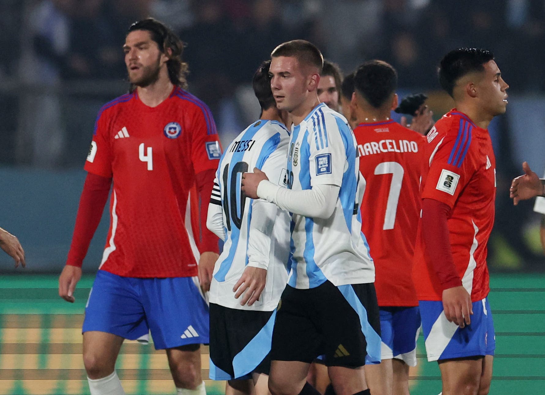 Franco Mastantuono and Lionel Messi during a match against Chile.