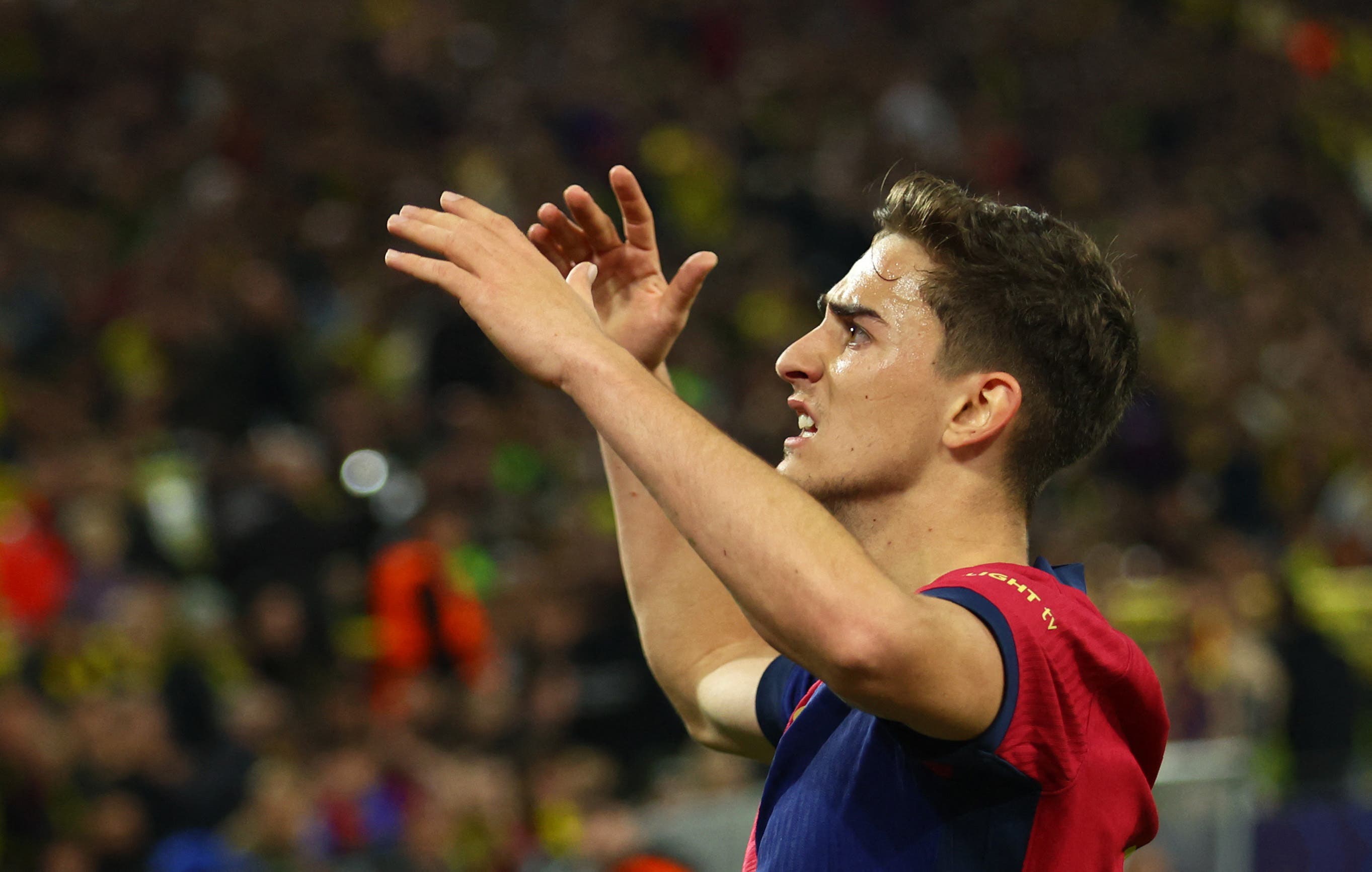 Soccer Football - Champions League - Quarter Final - Second Leg - Borussia Dortmund v FC Barcelona - Signal Iduna Park, Dortmund, Germany - April 15, 2025 FC Barcelona's Gavi celebrates their first goal, an own goal scored by Borussia Dortmund's Ramy Bensebaini REUTERS/Thilo Schmuelgen