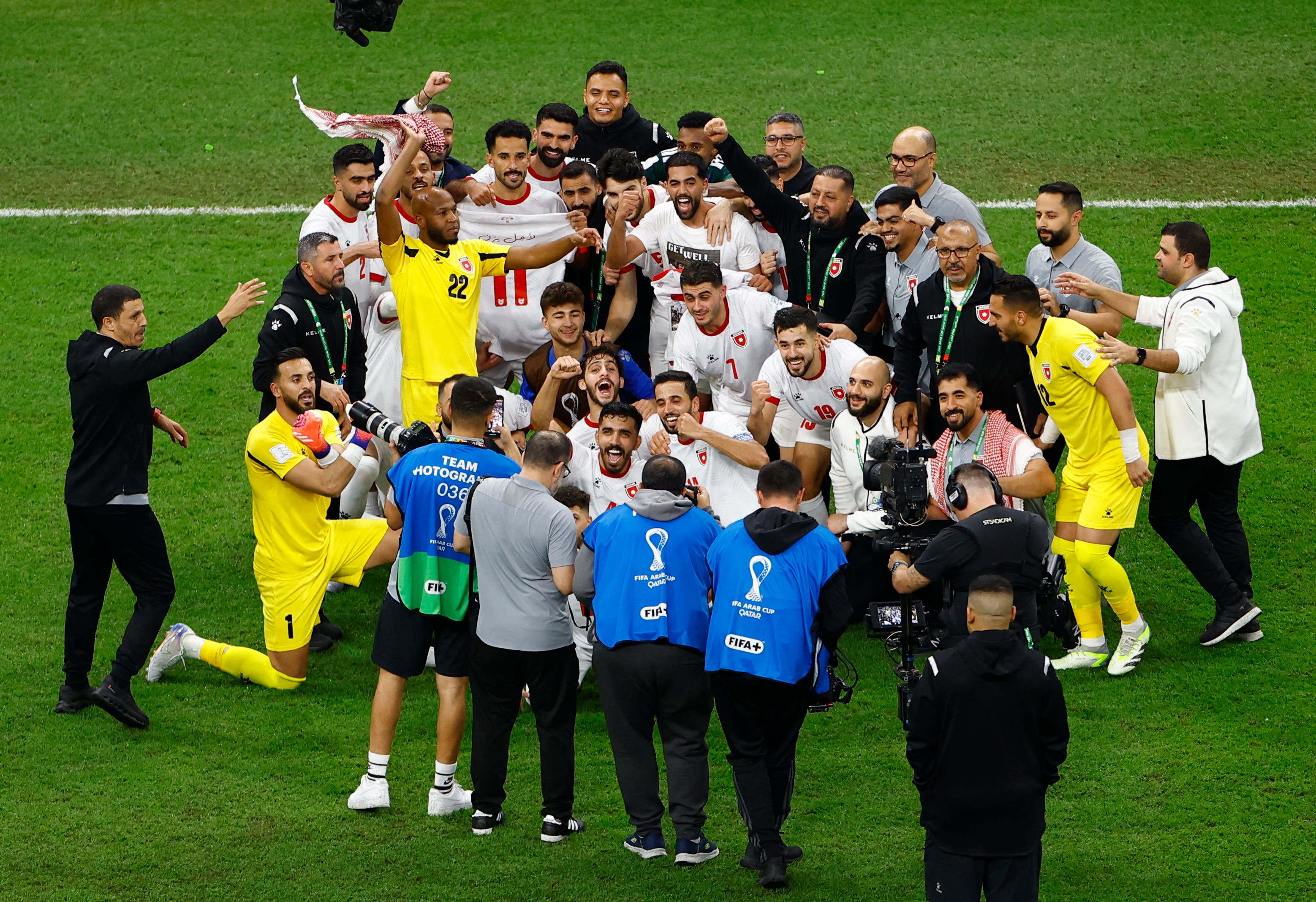 Soccer Football - FIFA Arab Cup - Qatar 2025 - Semi Final - Jordan v Saudi Arabia - Al Bayt Stadium, Al Khor, Qatar - December 15, 2025 Jordan pose for a team group photo after winning the match REUTERS/Rula Rouhana
