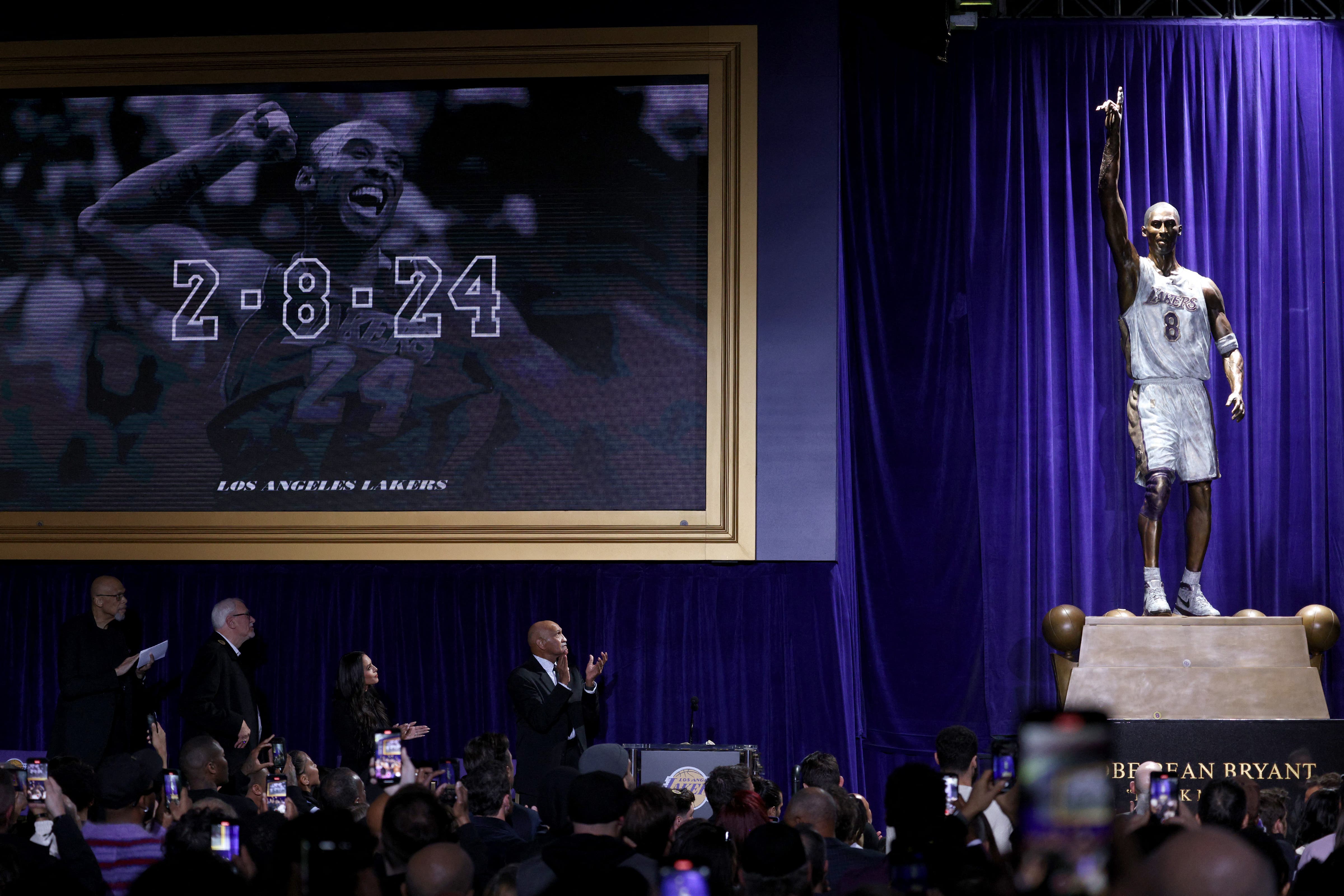Feb 8, 2024; Los Angeles, CA, USA; A statue for former Los Angeles Lakers guard Kobe Bryant is unveiled during a ceremony at Star Plaza outside of Crypto.com ArenaMandatory Credit: Jason Parkhurst-USA TODAY Sports