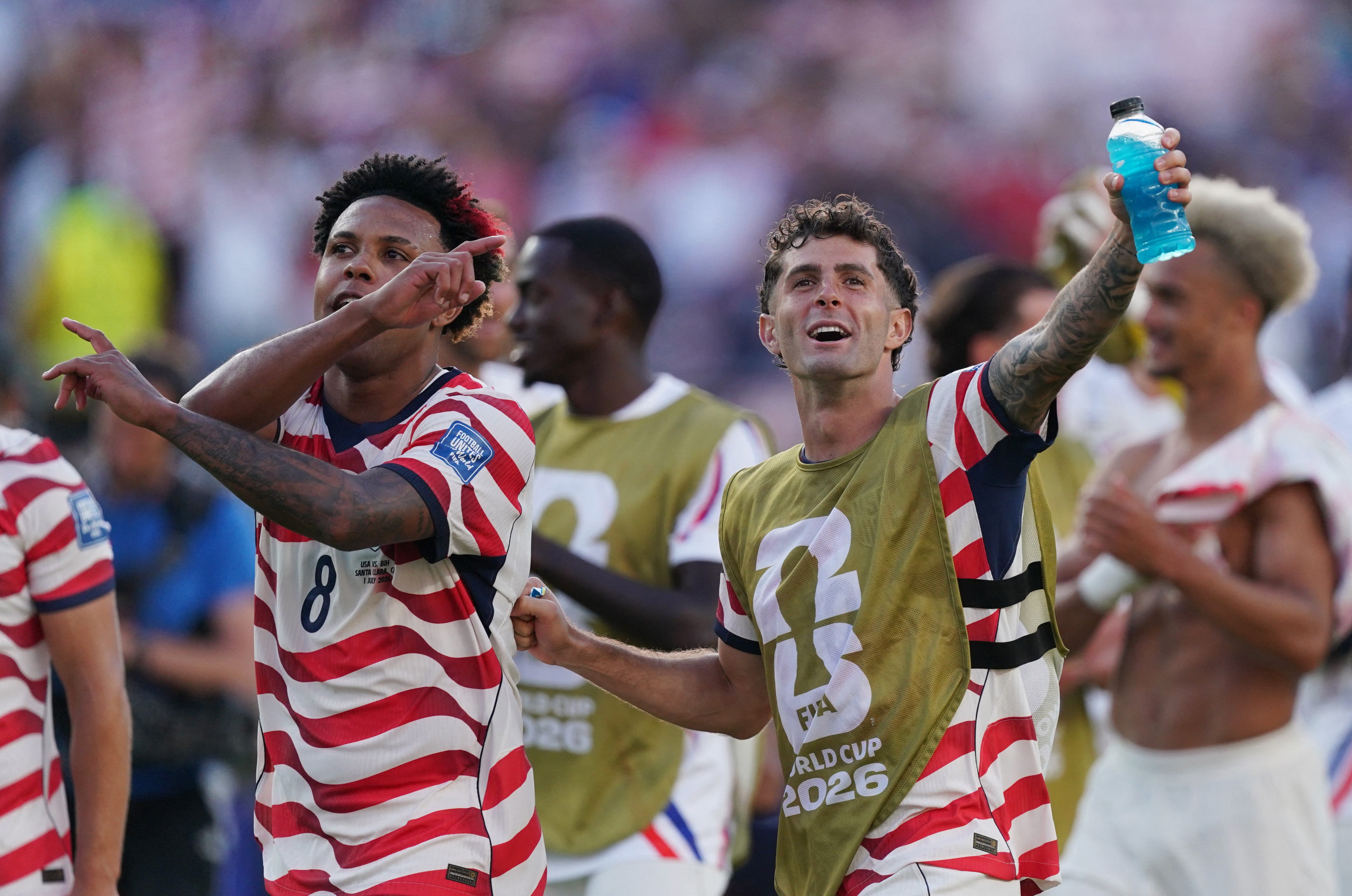 Soccer Football - FIFA World Cup 2026 - Round of 32 - United States v Bosnia and Herzegovina - San Francisco Bay Area Stadium, Santa Clara, California, U.S. - July 1, 2026 Christian Pulisic and Weston McKennie of the U.S. celebrate after the match as United States qualify for the round of 16 stage of the World Cup IMAGN IMAGES via Reuters/David Gonzales