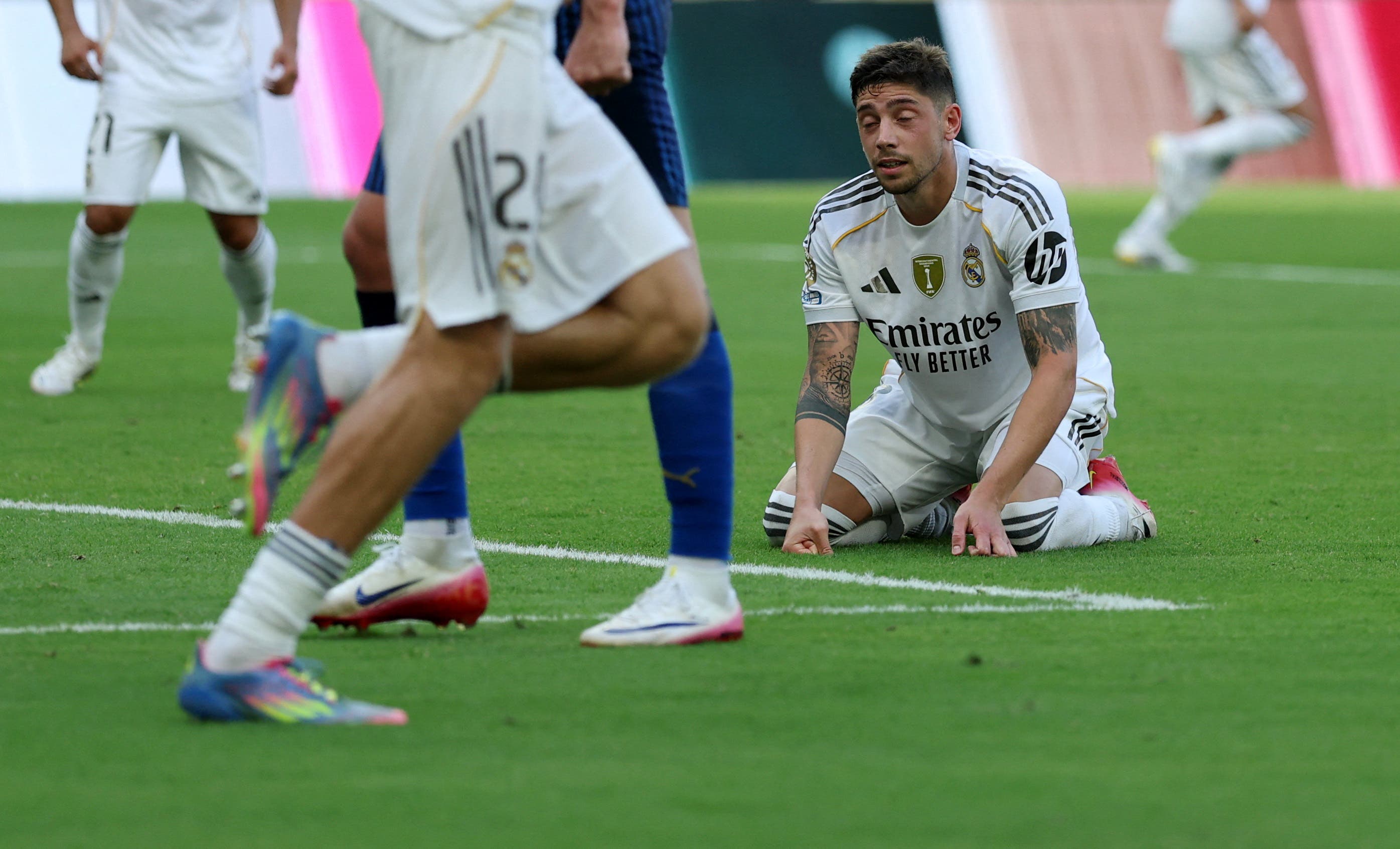 Real Madrid's Federico Valverde looks dejected after having his penalty saved by Al Hilal's Yassine Bounou