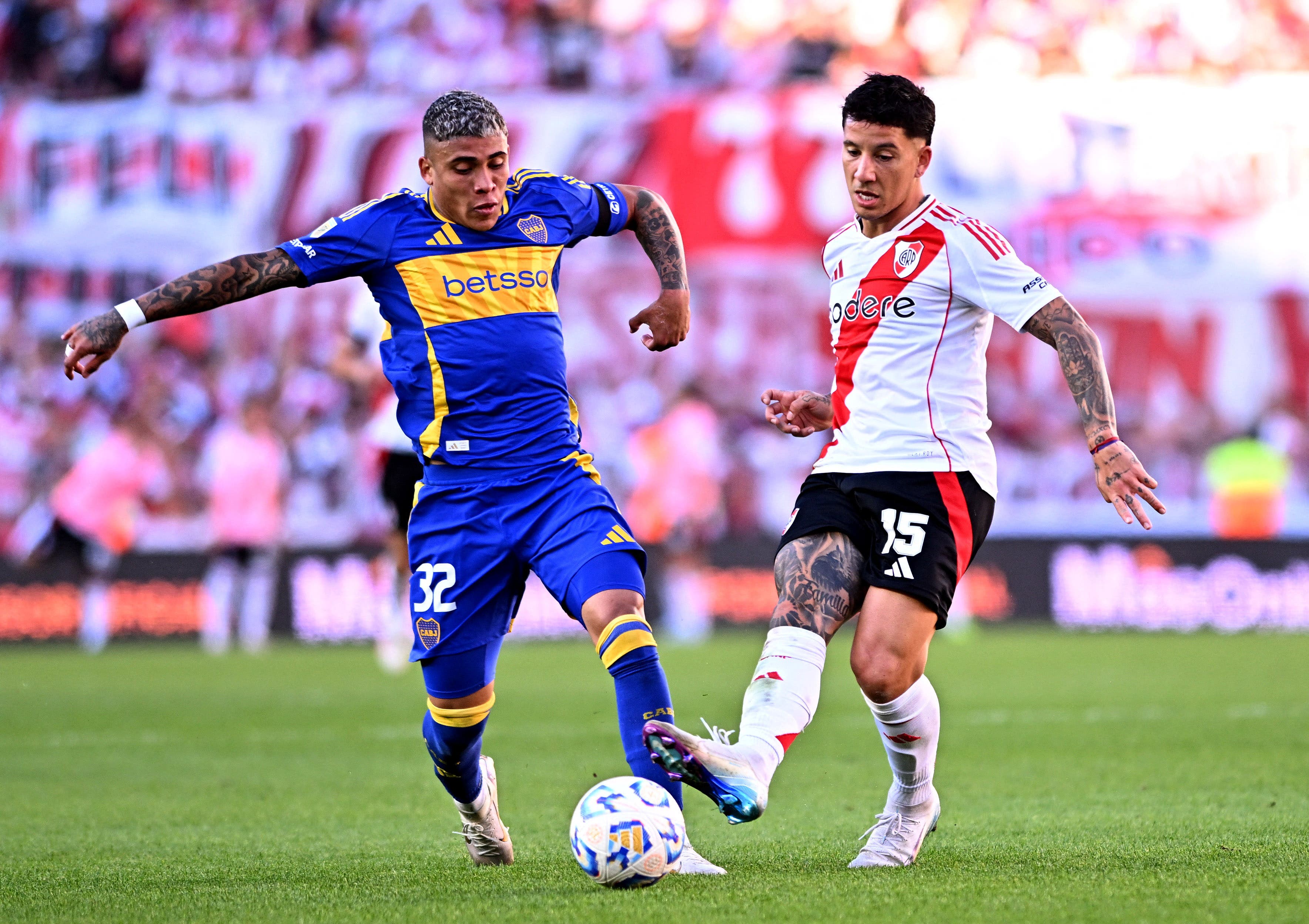 Boca Juniors' Ayrton Costa in action with River Plate's Sebastian Driussi 