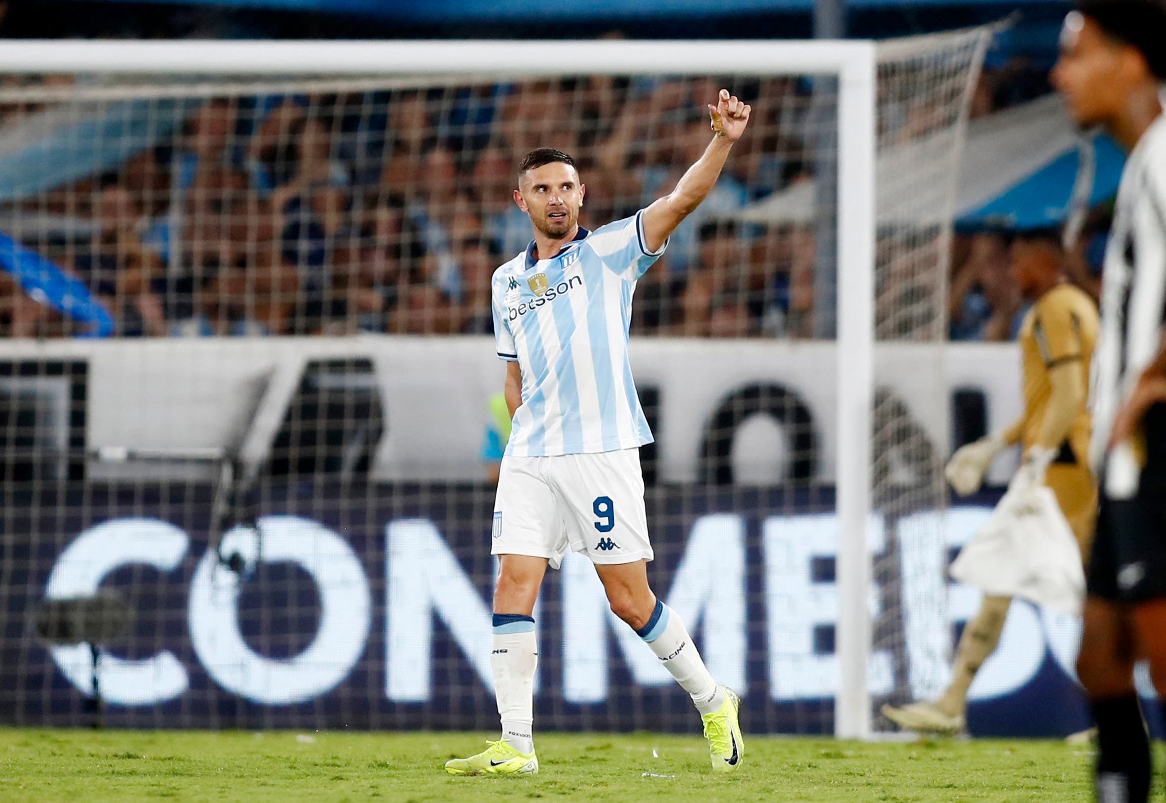 Soccer Football - Recopa Sudamericana - First Leg - Racing Club v Botafogo - Estadio Presidente Peron, Buenos Aires, Argentina- February 20, 2025 Racing Club's Adrian Martinez celebrates scoring their second goal REUTERS/Cristina Sille