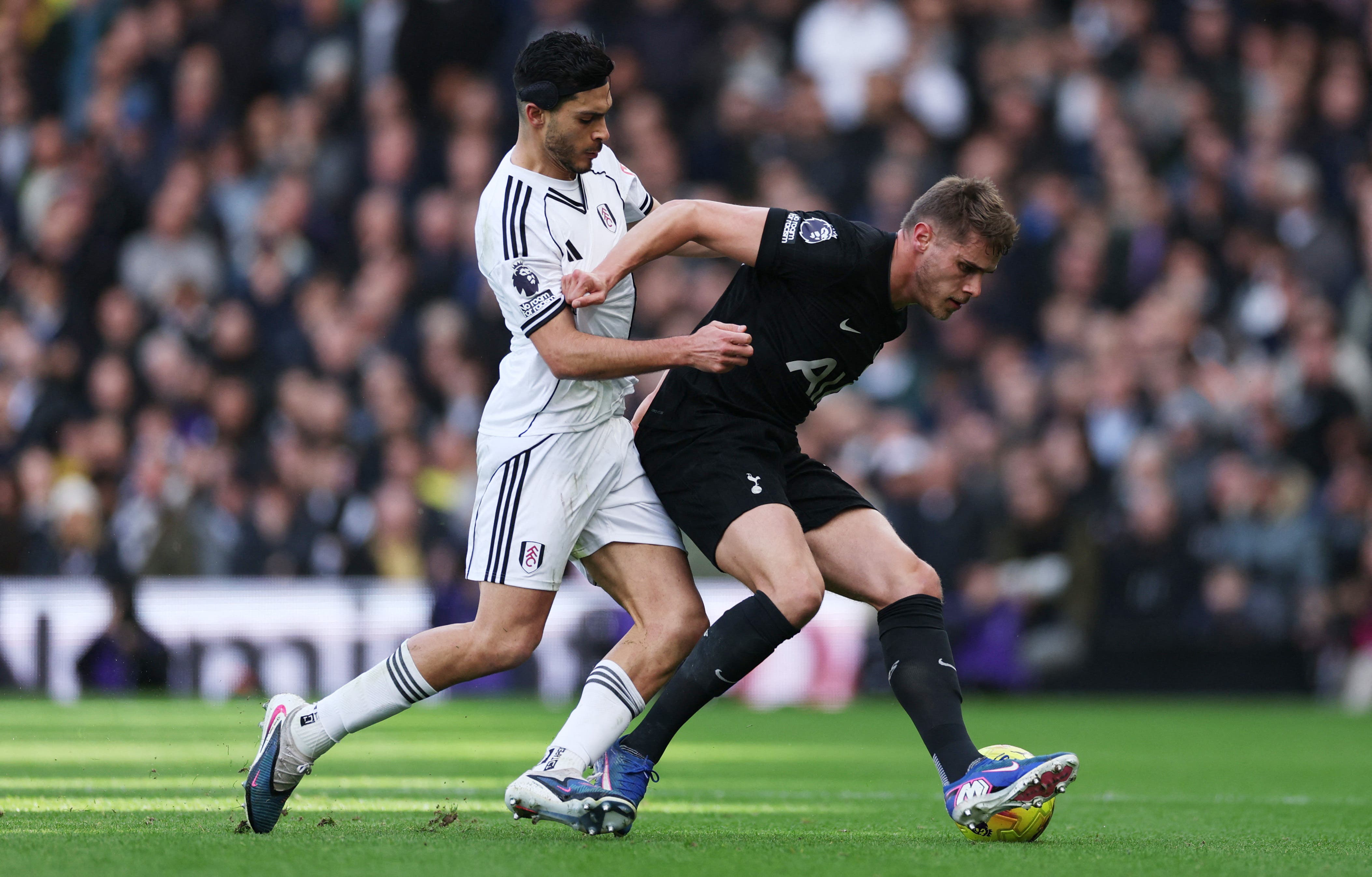 Soccer Football - Premier League - Fulham v Tottenham Hotspur - Craven Cottage, London, Britain - March 1, 2026 Tottenham Hotspur's Micky van de Ven in action with Fulham's Raul Jimenez REUTERS/Ian Walton