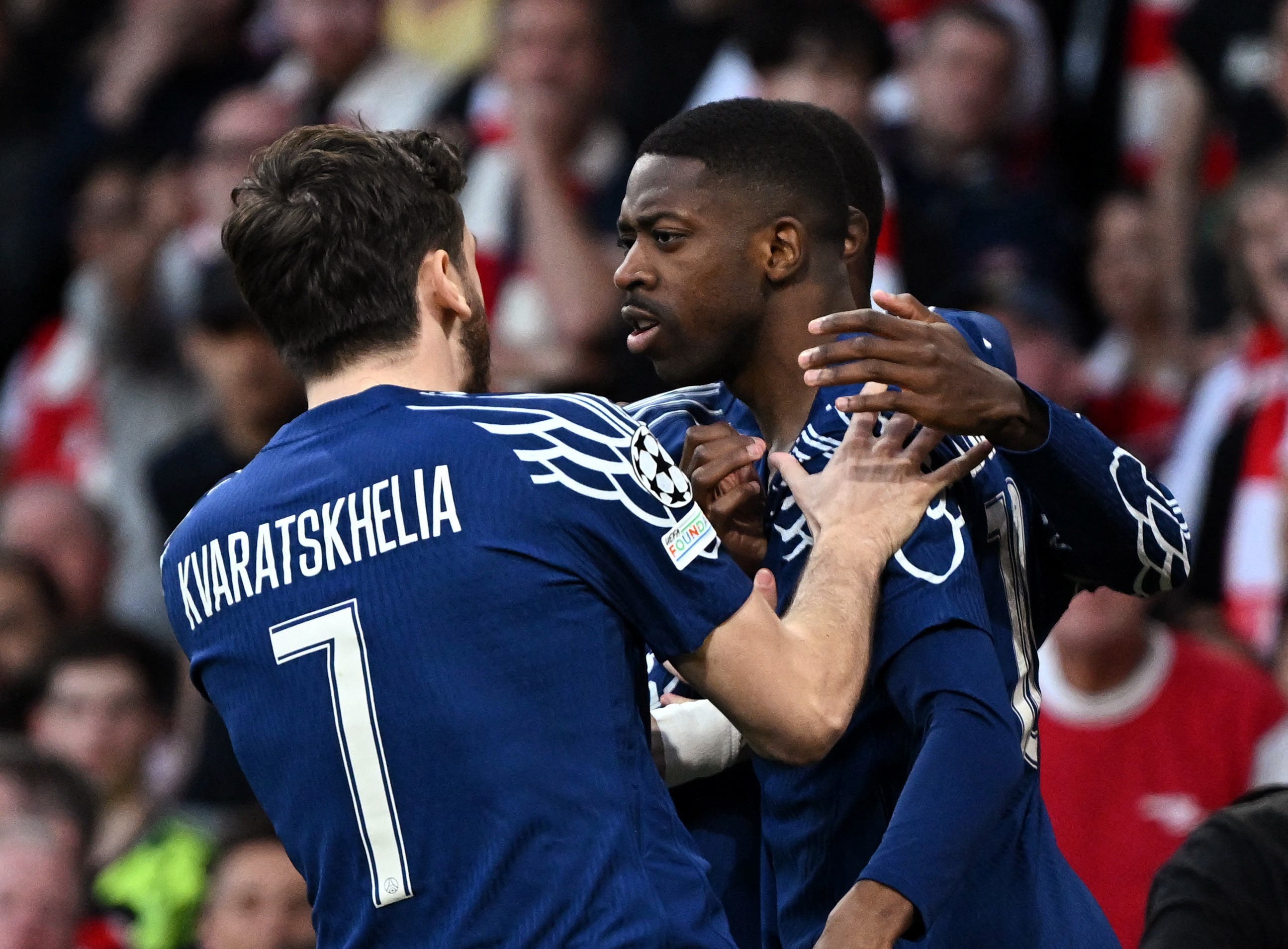 Paris St Germain's Ousmane Dembele celebrates scoring their first goal with Khvicha Kvaratskhelia 