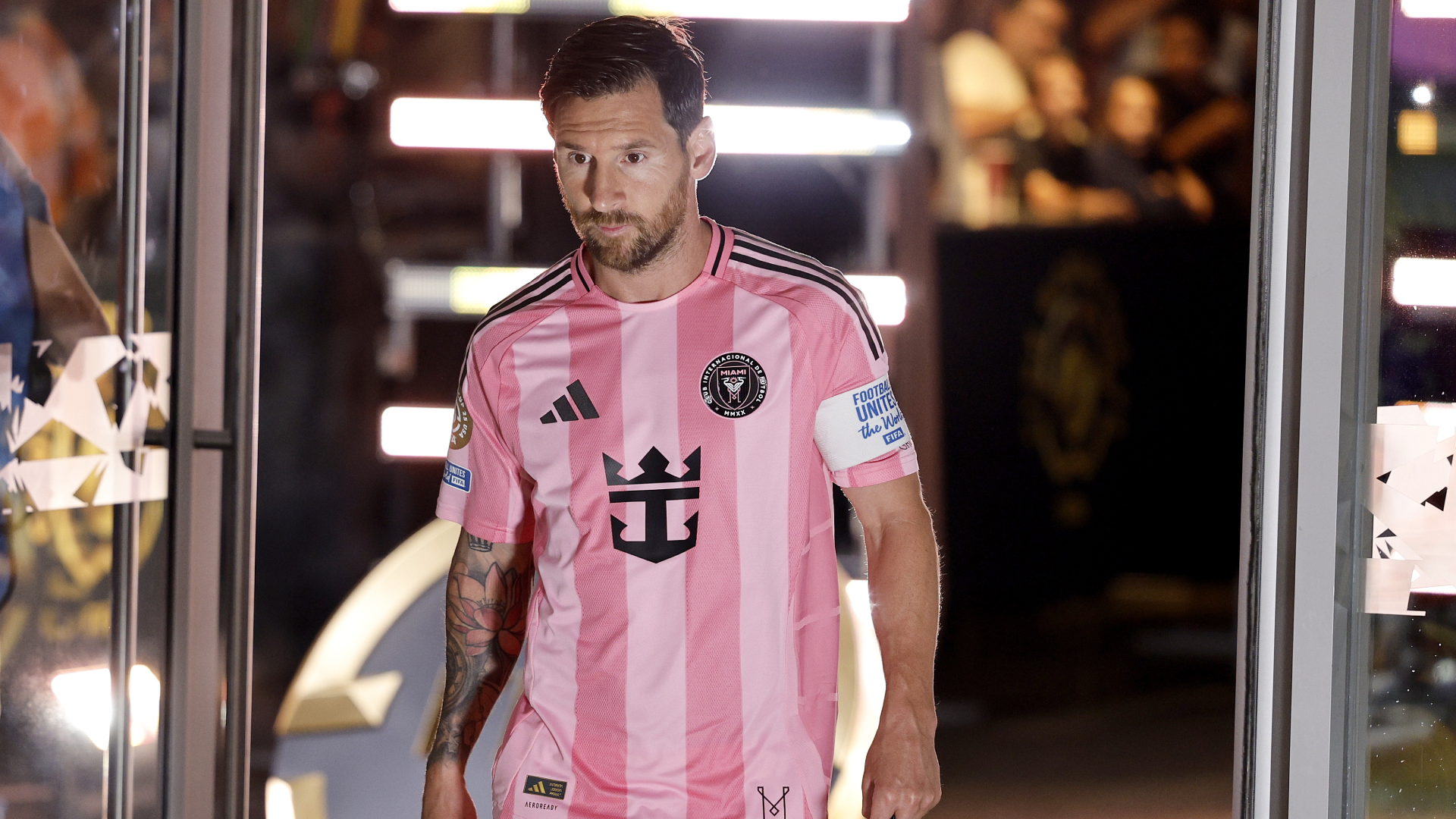 Lionel Messi enters the field in the game against Porto for the Club World Cup.