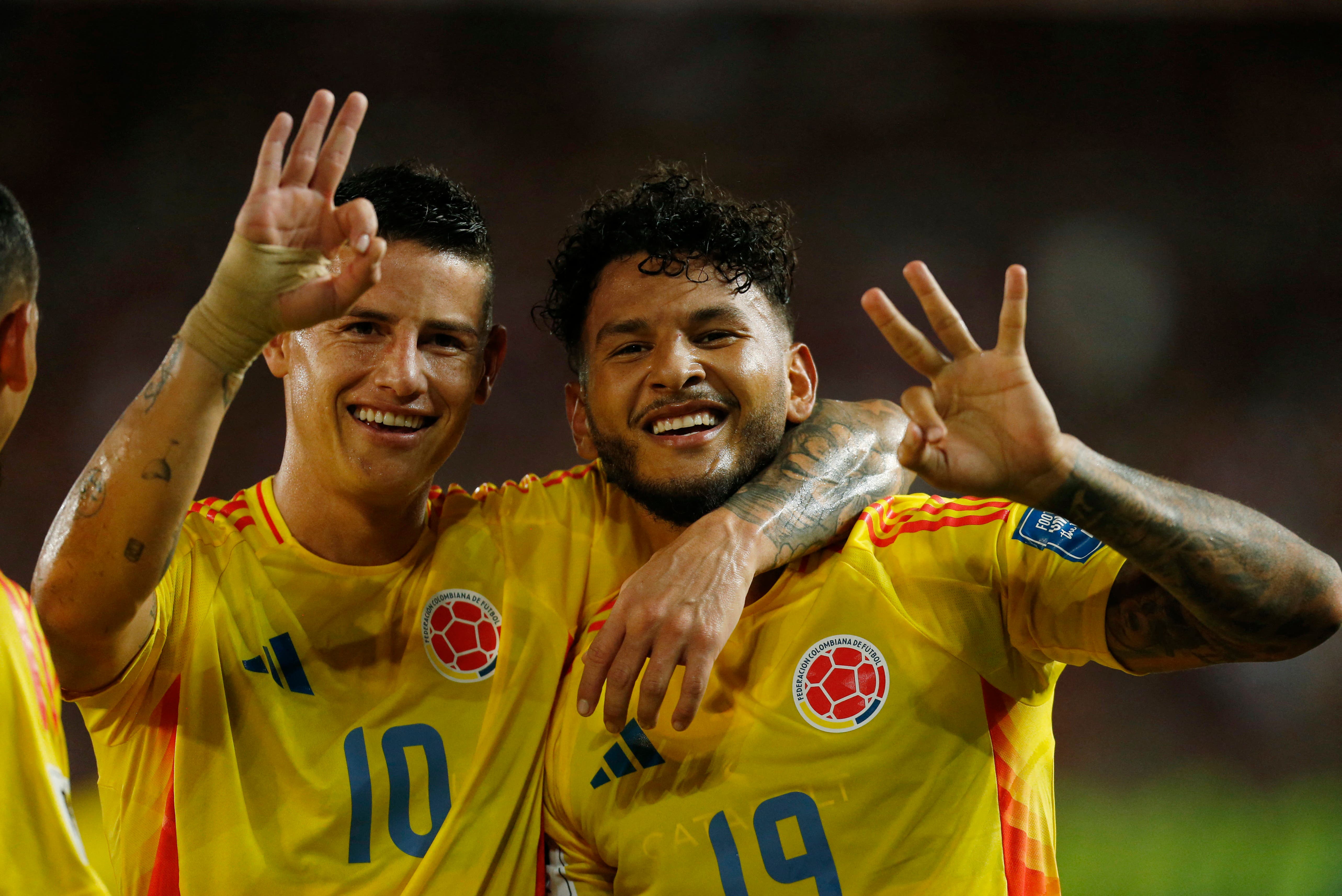 Soccer Football - World Cup - CONMEBOL Qualifiers - Venezuela v Colombia - Estadio Monumental de Maturin, Maturin, Venezuela - September 9, 2025 Colombia's Luis Suarez celebrates scoring their fourth goal to complete a hat-trick with James Rodriguez REUTERS/Leonardo Fernandez Viloria