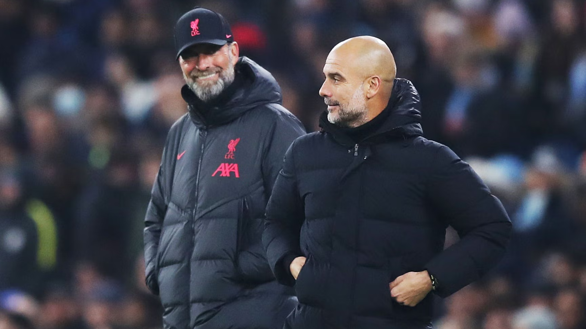 Jürgen Klopp and Pep Guardiola during a Premier League match between Liverpool and Manchester City.