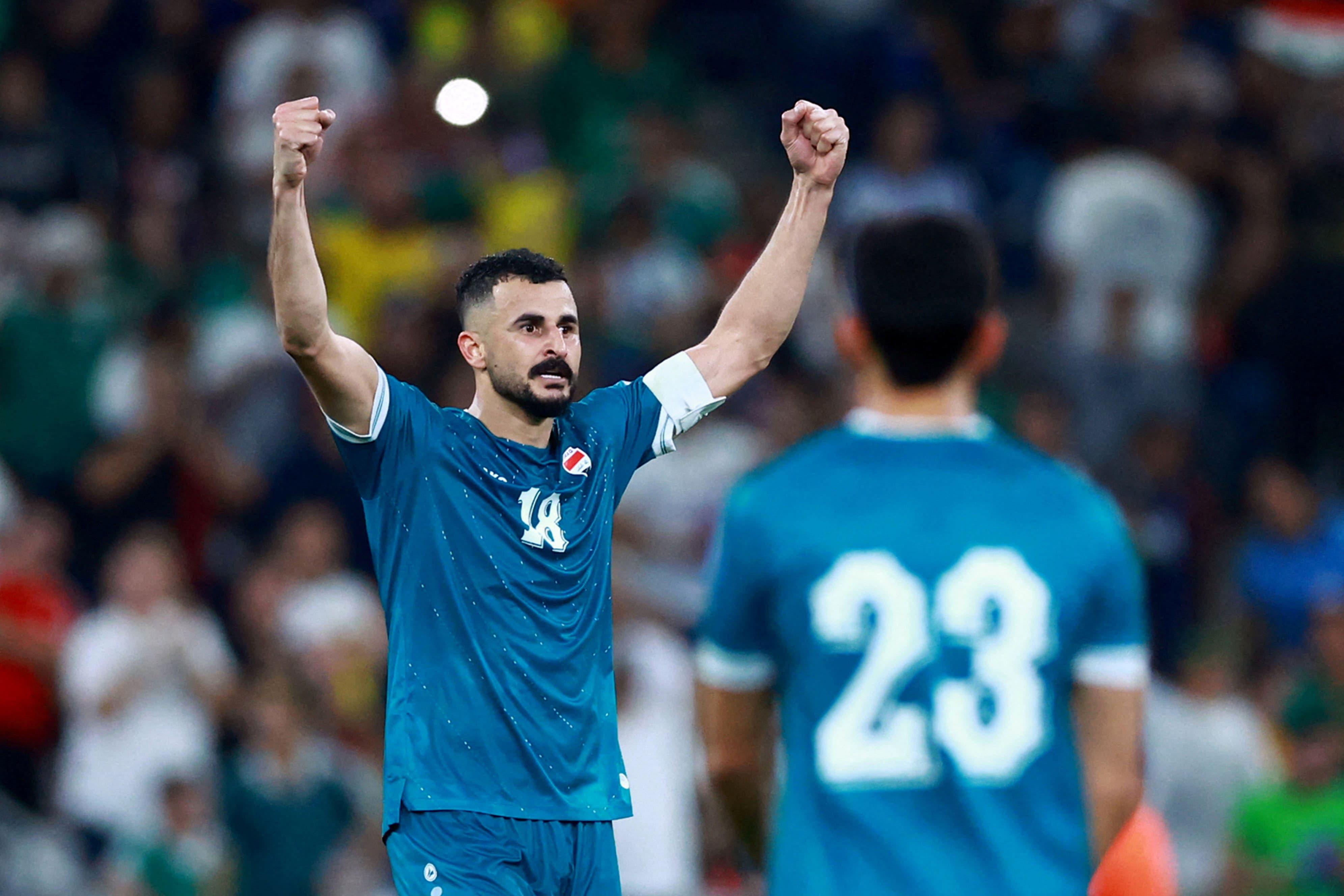 Soccer Football - FIFA World Cup - Inter-Confederation Playoffs - Final - Iraq v Bolivia - Estadio Monterrey, Monterrey, Mexico - March 31, 2026 Iraq's Aymen Hussein celebrates scoring their second goal REUTERS/Raquel Cunha