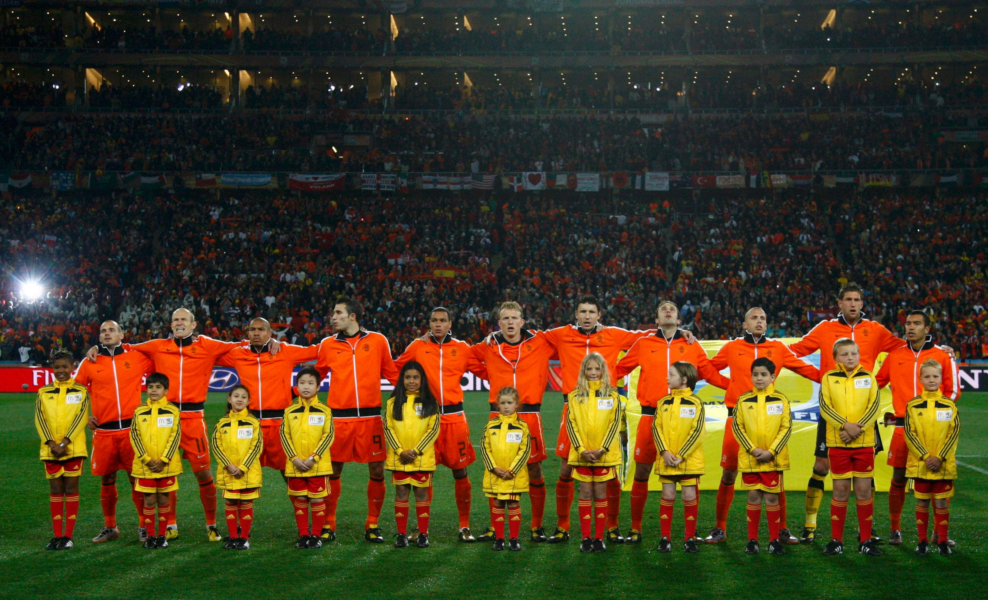 Netherland's players sing the national anthem before their 2010 World Cup final soccer match against Spain at Soccer City stadium in Johannesburg July 11, 2010. REUTERS/Jerry Lampen (SOUTH AFRICA - Tags: SPORT SOCCER WORLD CUP)