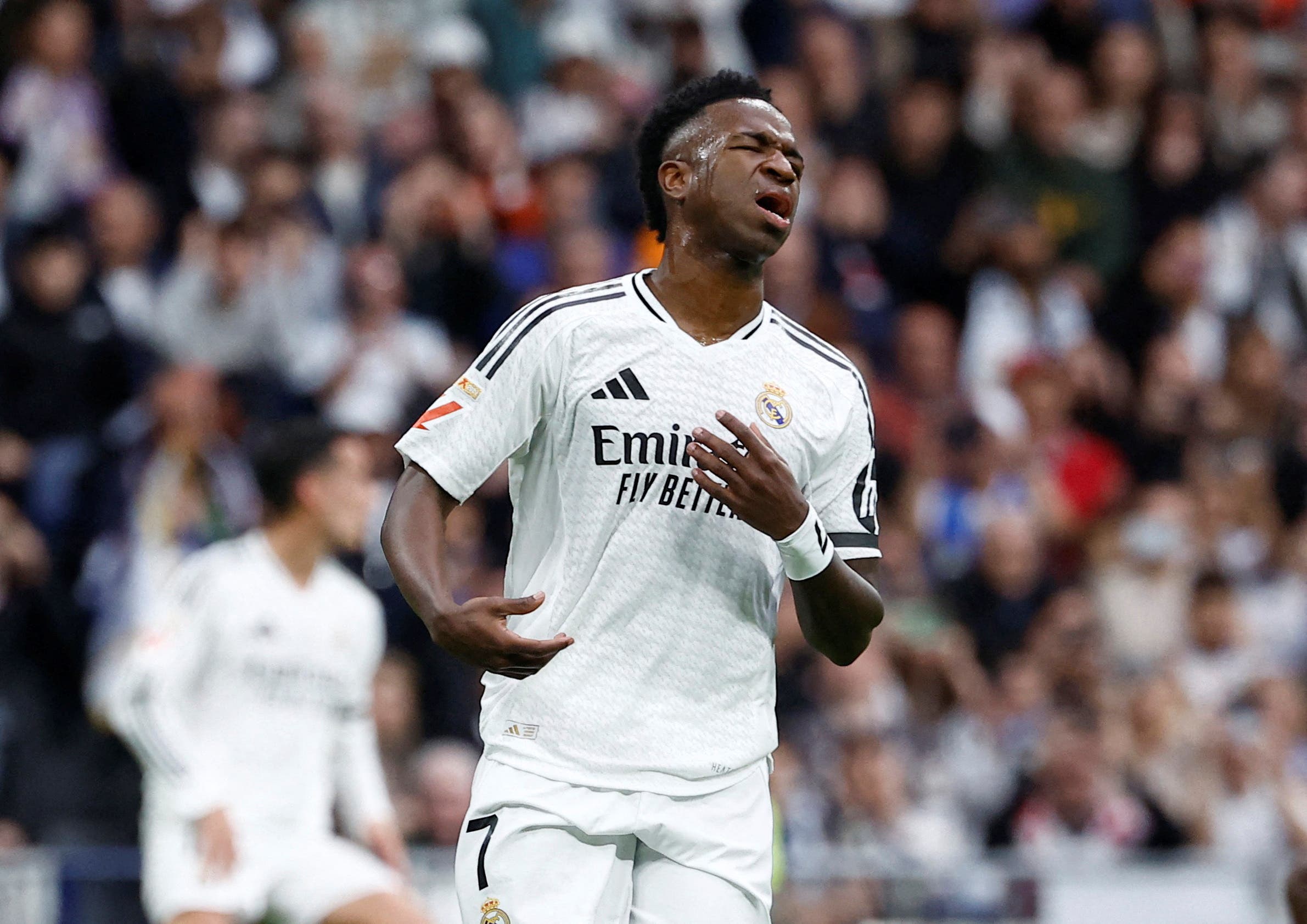 Real Madrid's Vinicius Junior reacts after missing a penalty kick