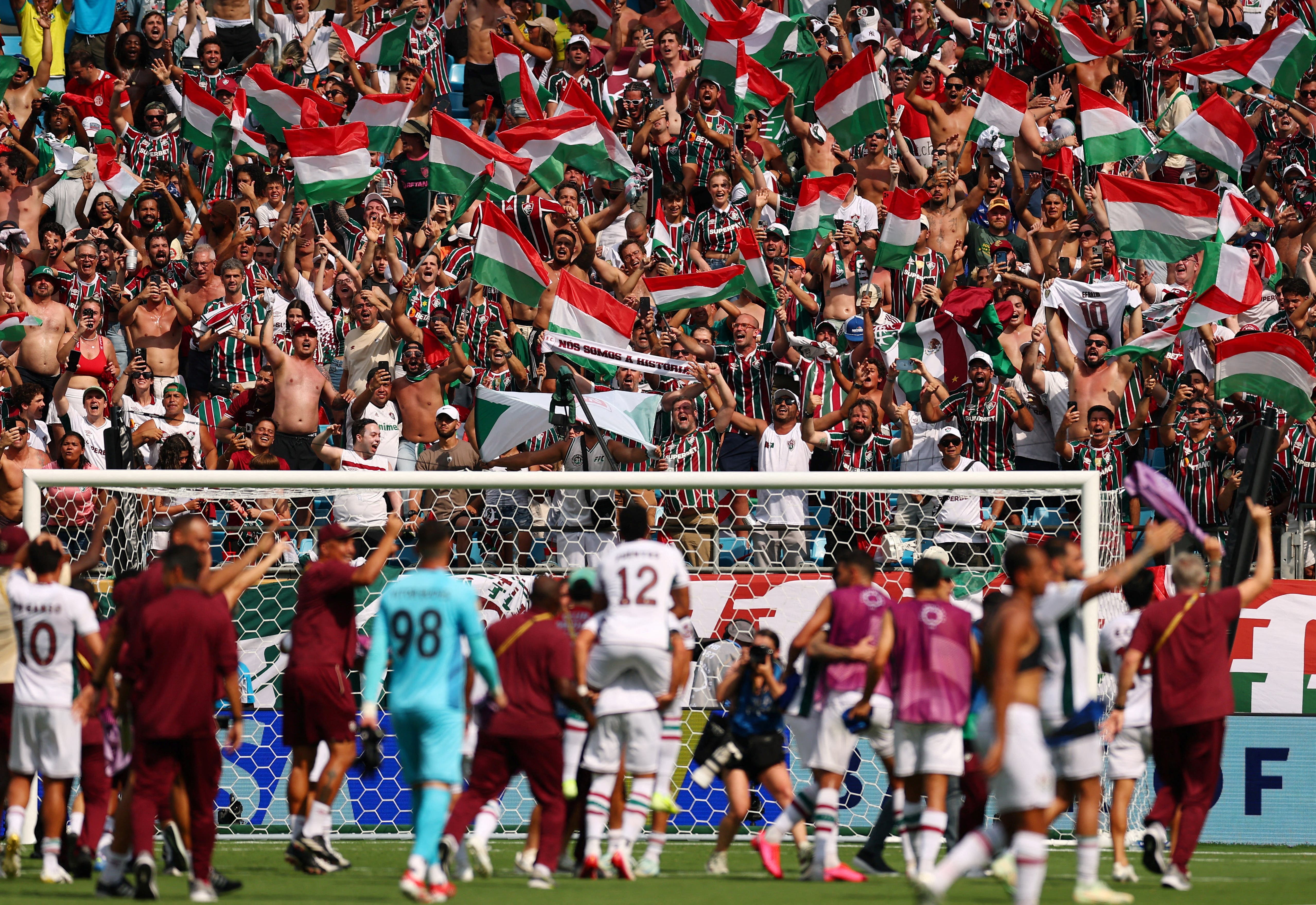 Fluminense players celebrate after the match 