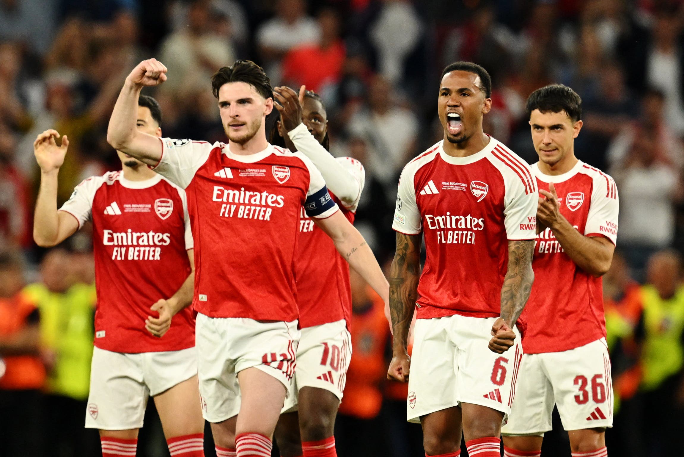 Soccer Football - UEFA Champions League - Final - Paris St Germain v Arsenal - Puskas Arena, Budapest, Hungary - May 30, 2026 Arsenal's Declan Rice and Gabriel Magalhaes react during the penalty shootout REUTERS/Angelika Warmuth

