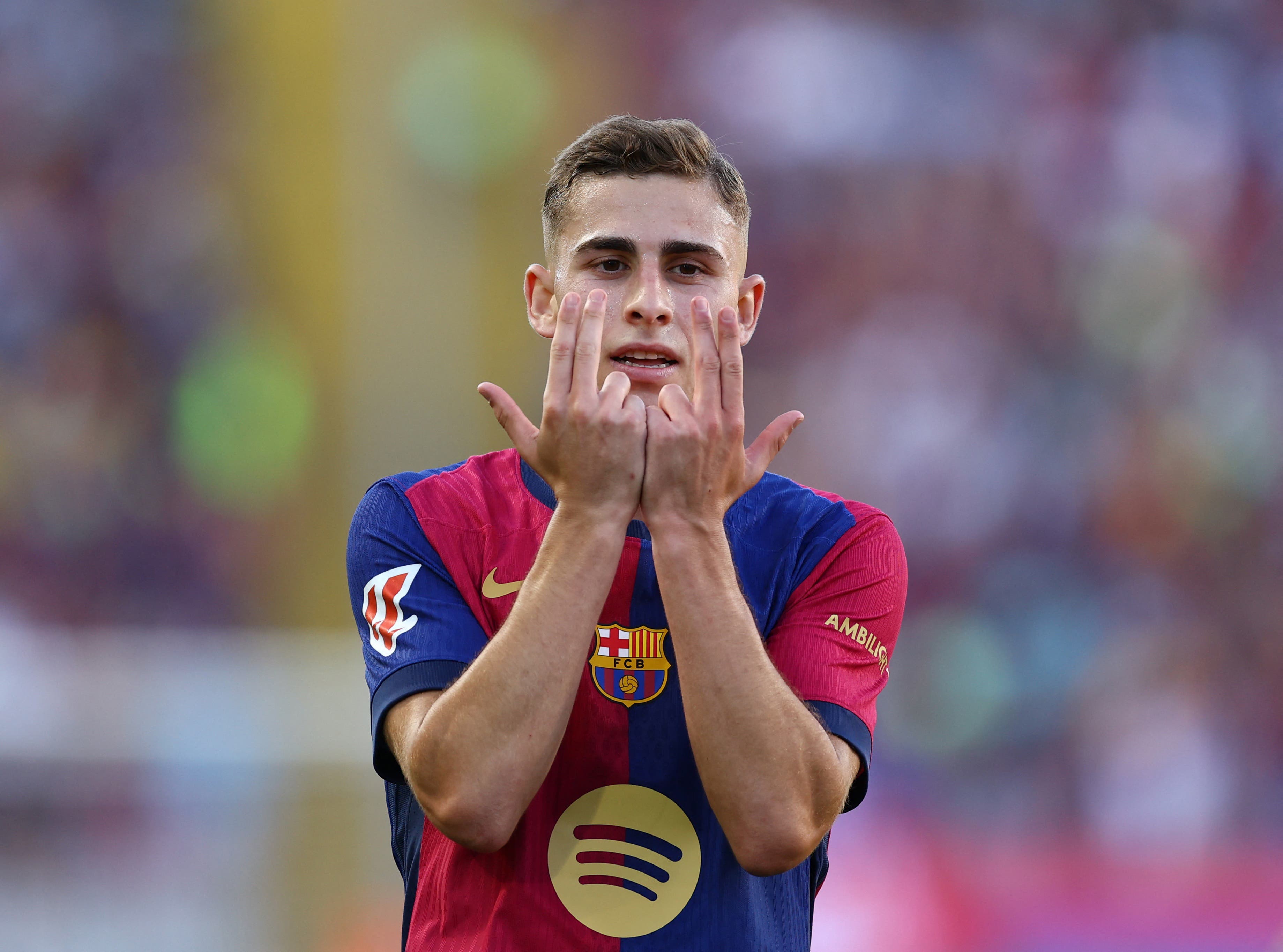 Fermín Lópes celebrates during a match with FC Barcelona.