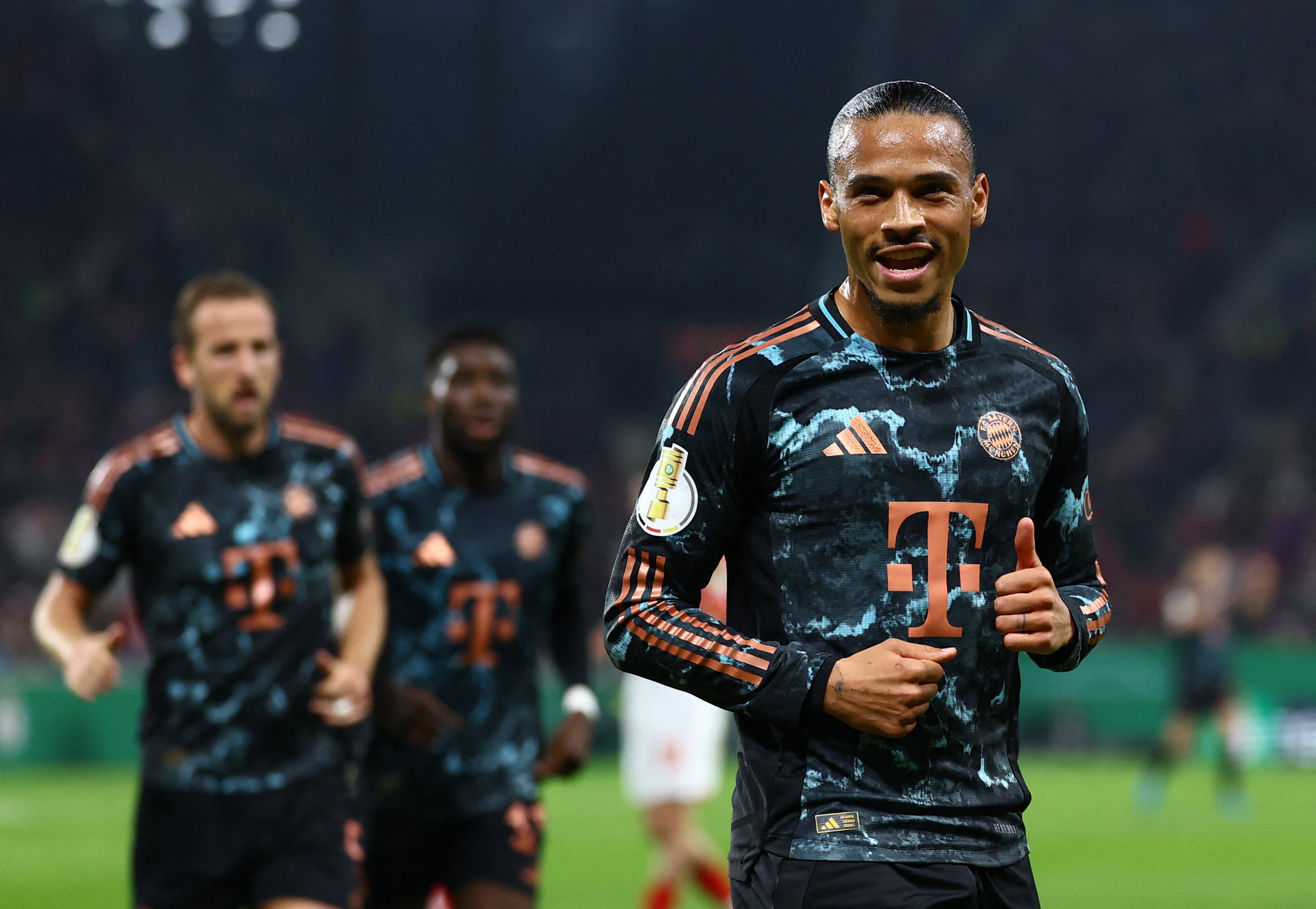 Bayern Munich's Leroy Sane celebrates scoring their third goal