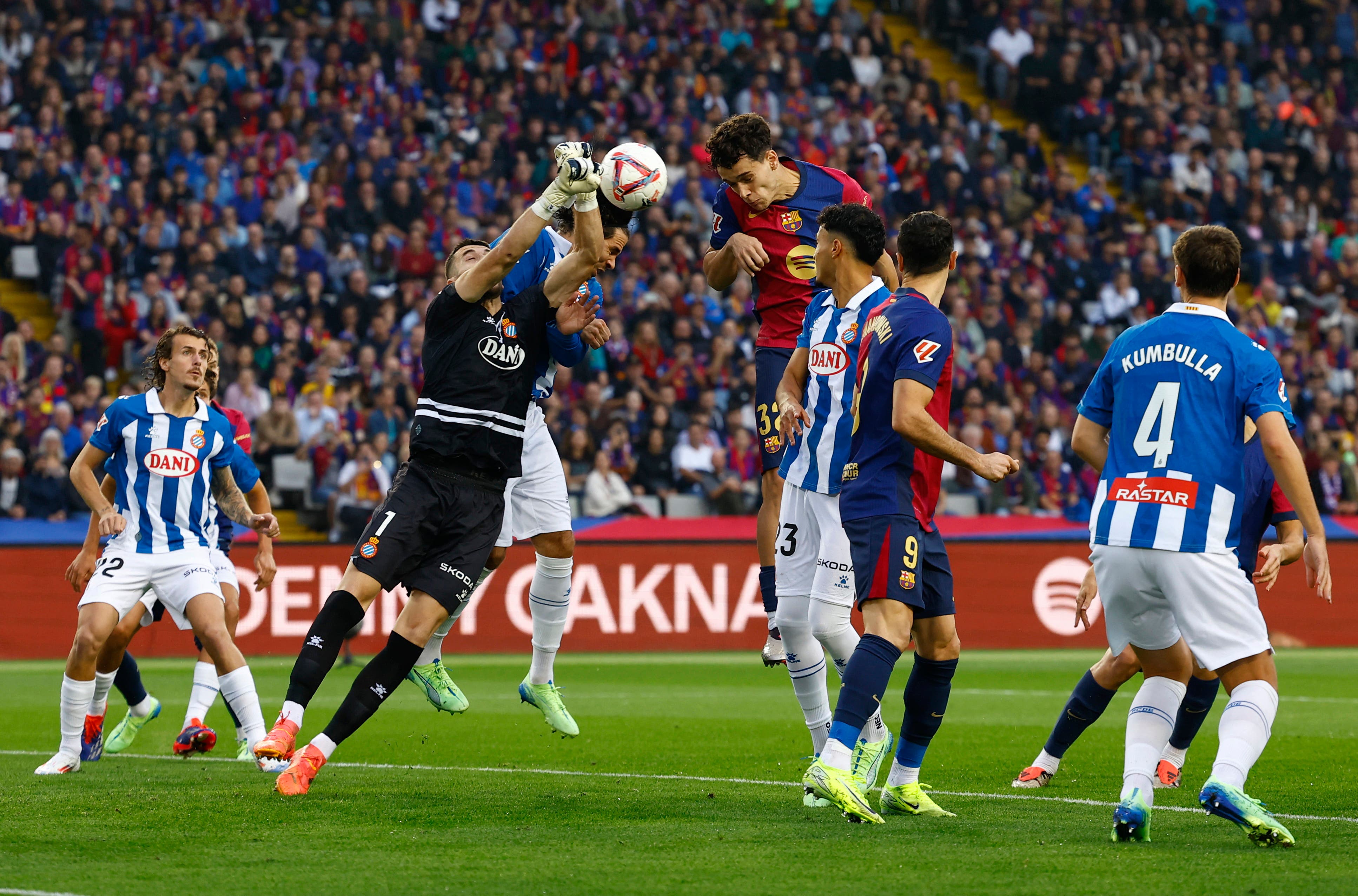  RCD Espanyol's Joan Garcia in action with FC Barcelona's Hector Fort 