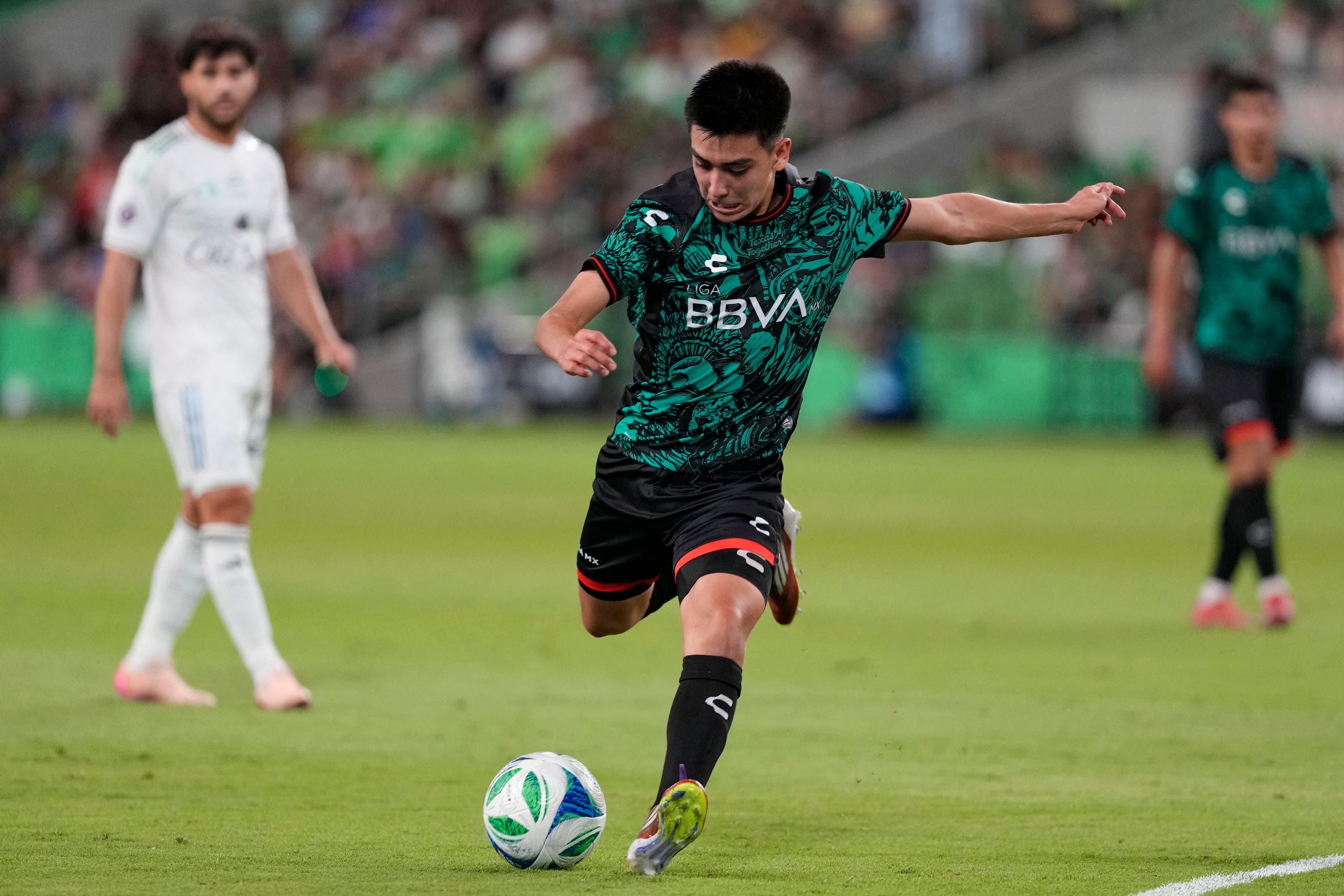Jul 23, 2025; Austin, Texas, USA; Liga MX All Stars midfielder Gilberto Mora (19) of Tijuana kicks the ball during the second half for the 2025 MLS All-Star Game at Q2 Stadium. Mandatory Credit: Scott Wachter-Imagn Images
