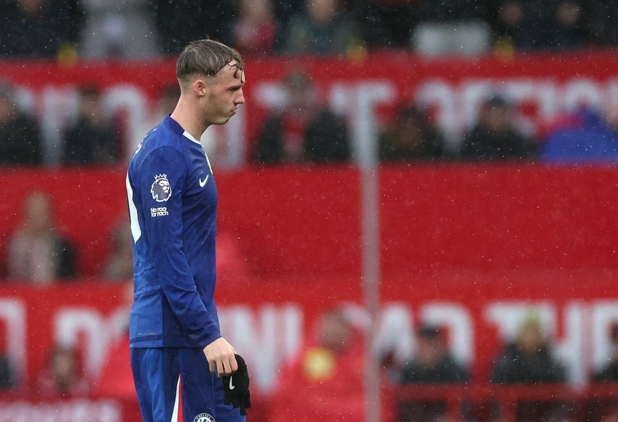 Cole Palmer walks off the pitch during a match with Chelsea. 