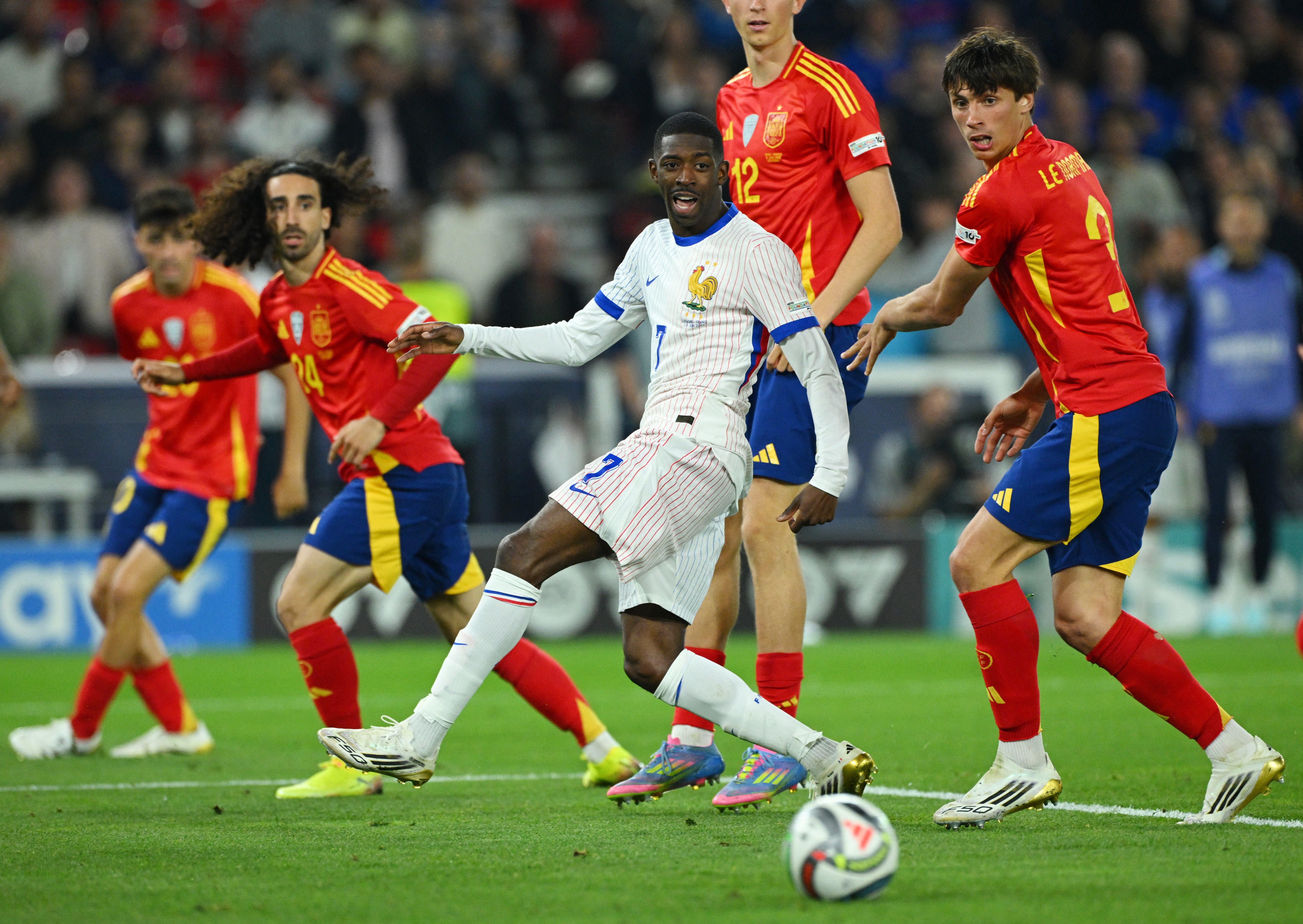 Spain's Robin Le Normand in action with France's Ousmane Dembele