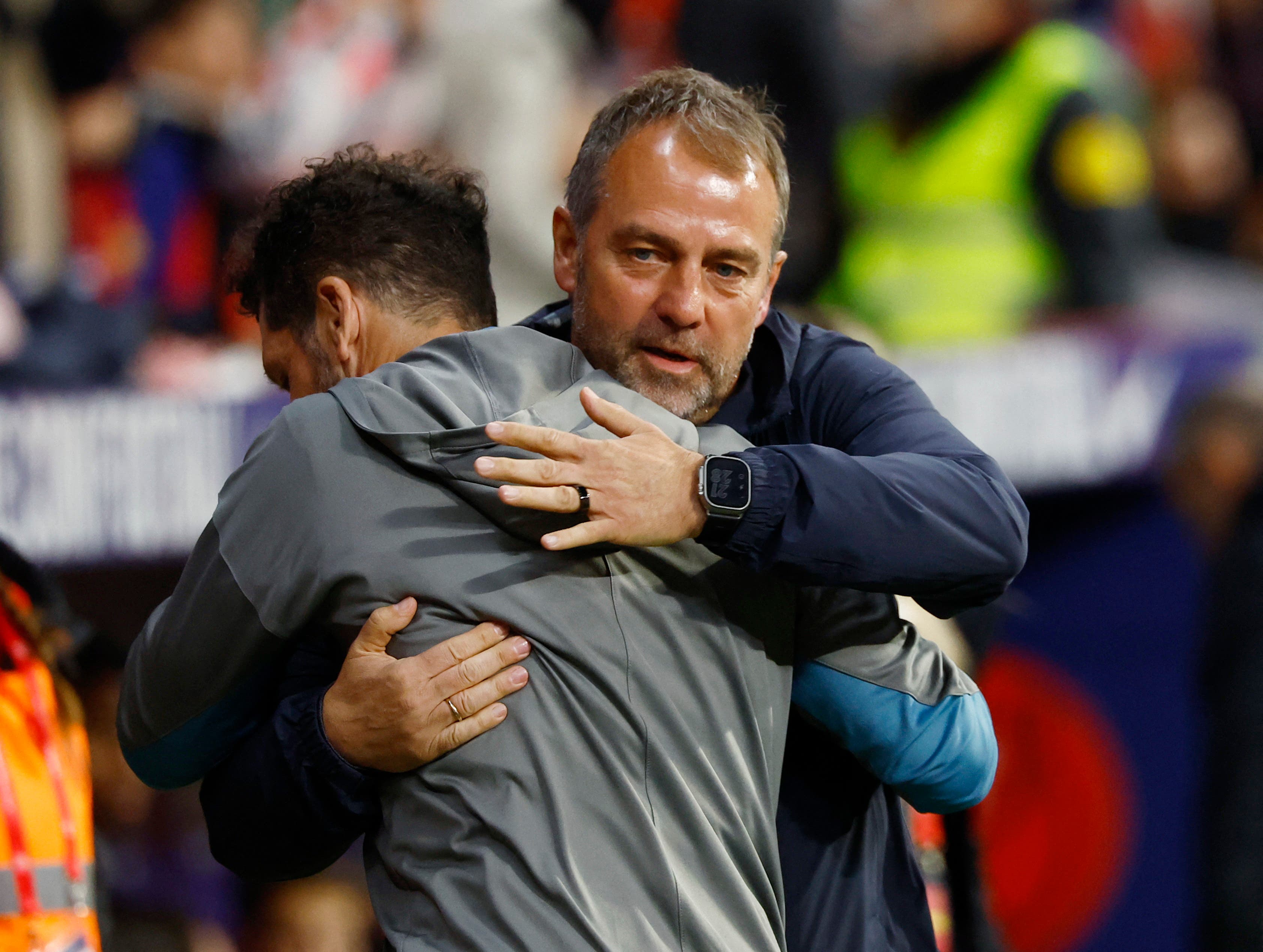 Soccer Football - Copa del Rey - Semi Final - Second Leg - Atletico Madrid v FC Barcelona - Metropolitano, Madrid, Spain - April 2, 2025 Atletico Madrid coach Diego Simeone with FC Barcelona coach Hansi Flick before the match REUTERS/Susana Vera