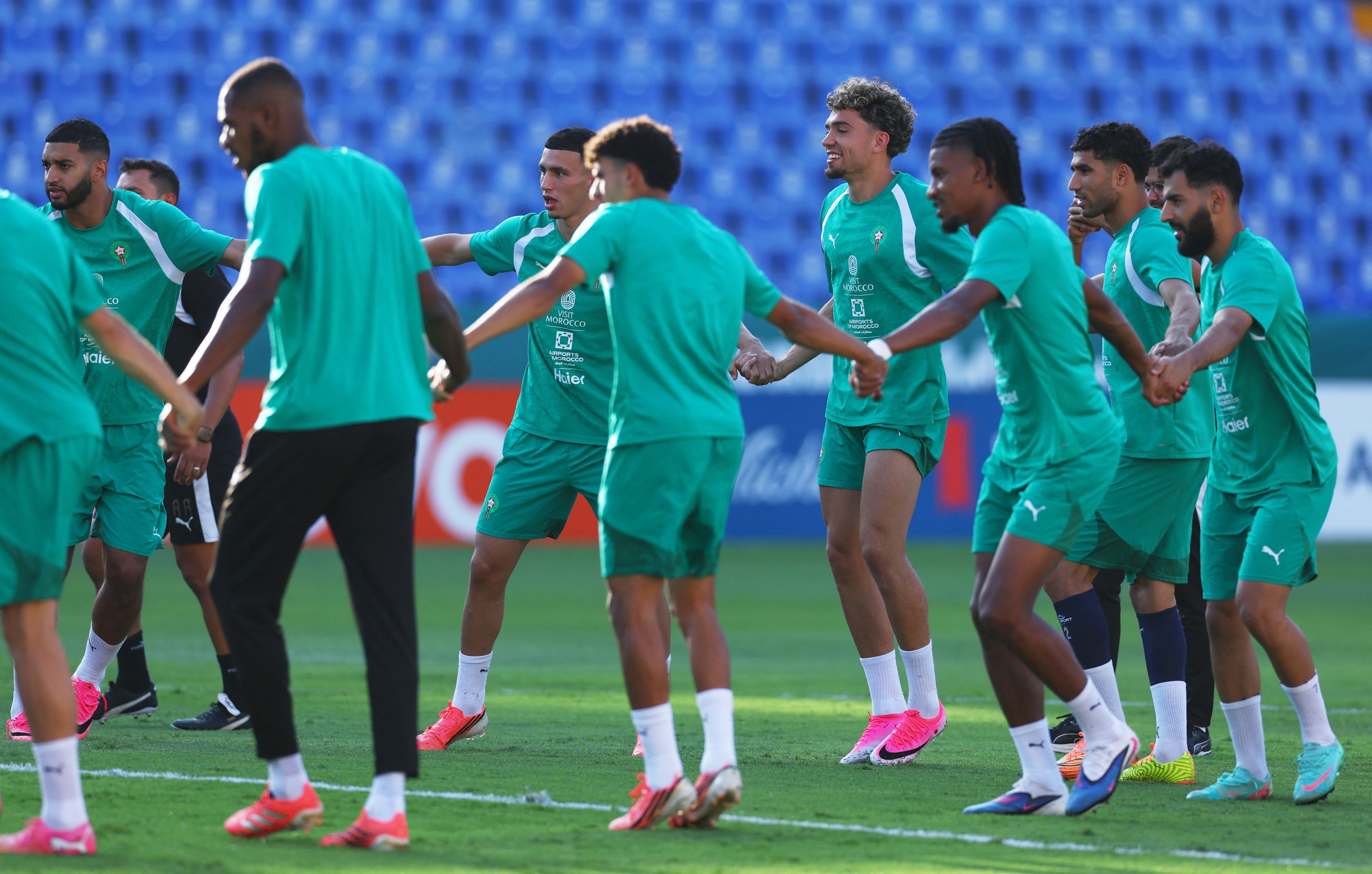 Soccer Football - FIFA World Cup 2026 - Morocco Training - Estadio Universitario, Monterrey, Mexico - June 27, 2026 Morocco's Achraf Hakimi, Bilal El Khannouss and Ismael Saibari with teammates during training REUTERS/Daniel Becerril

