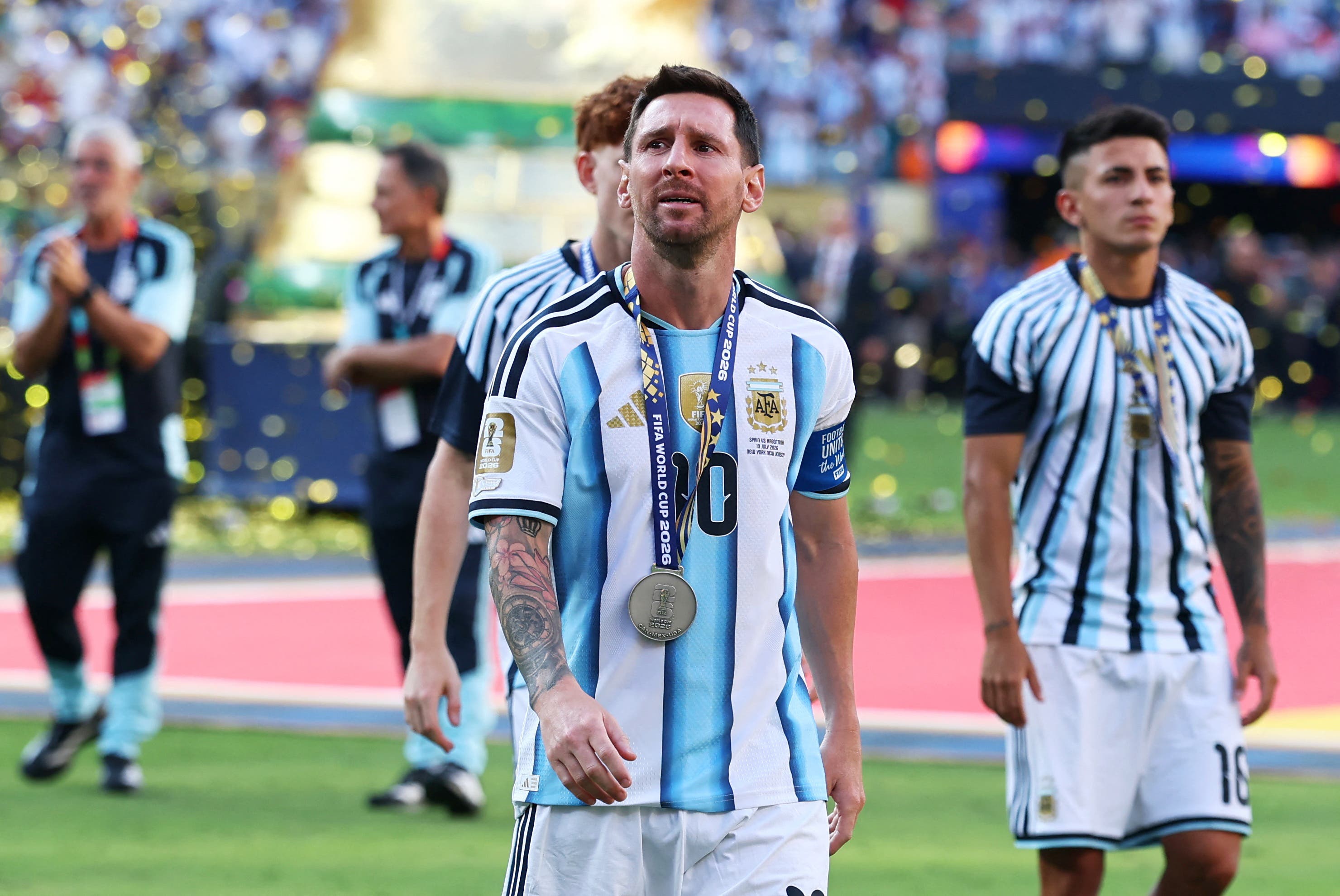 Soccer Football - FIFA World Cup 2026 - Final - Spain v Argentina - New York/New Jersey Stadium, East Rutherford, New Jersey, U.S. - July 19, 2026 Argentina's Lionel Messi with the runners-up medal as he looks dejected after the match IMAGN IMAGES via Reuters/Vincent Carchietta

