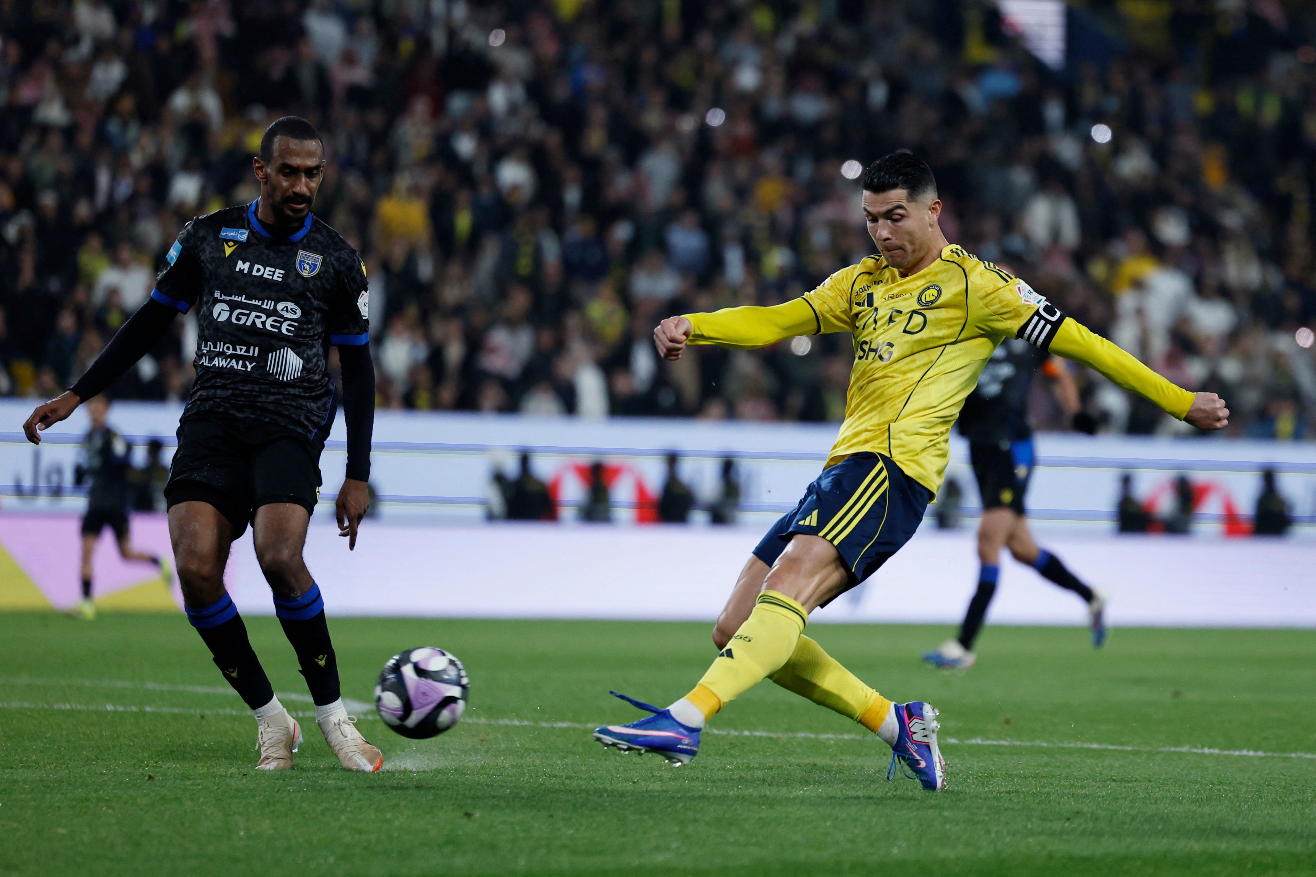 Soccer Football - Saudi Pro League - Al Nassr v Al Taawoun - Al Awwal Park, Riyadh, Saudi Arabia - January 26, 2026 Al Nassr's Cristiano Ronaldo shoots at goal REUTERS/Hamad I Mohammed