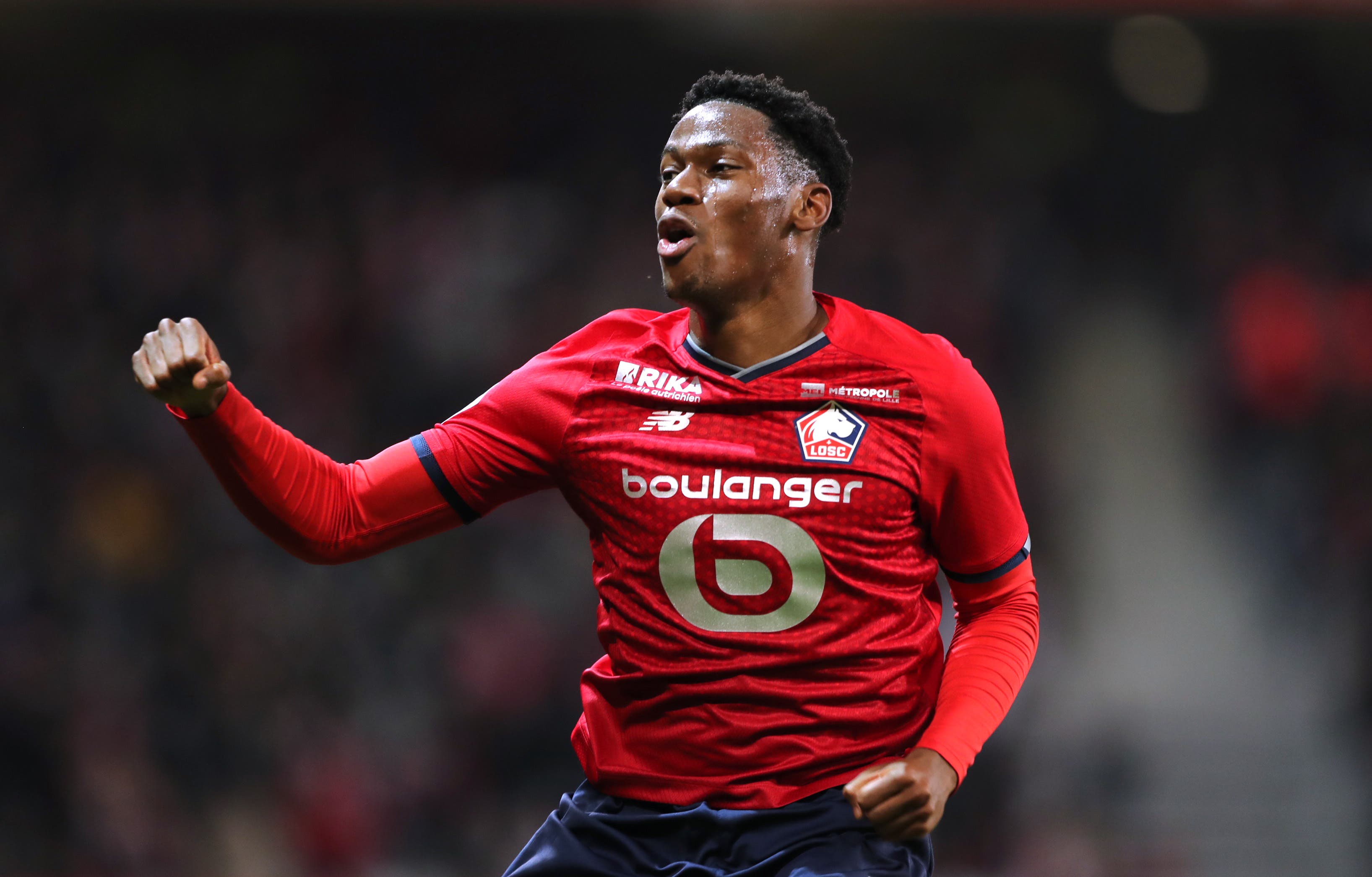 Lille's Jonathan David celebrates scoring