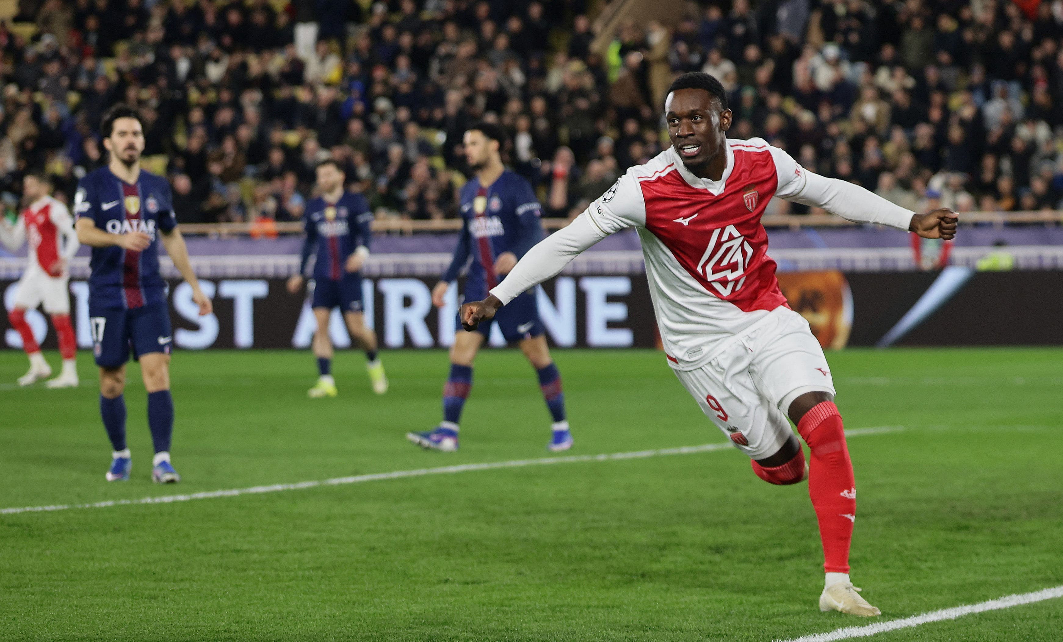 Soccer Football - UEFA Champions League - Play Off - First Leg - AS Monaco v Paris St Germain - Stade Louis II, Monaco - February 17, 2026 AS Monaco's Folarin Balogun celebrates scoring their first goal REUTERS/Manon Cruz