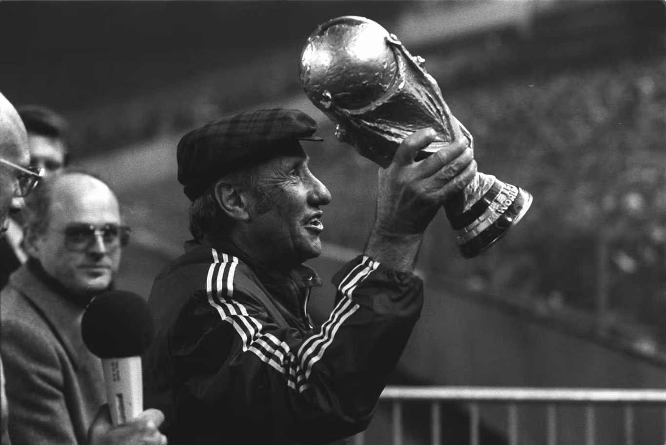 Helmut Schön lifts the World Cup trophy. ALL RIGHTS BELONGS TO www.fifa.com