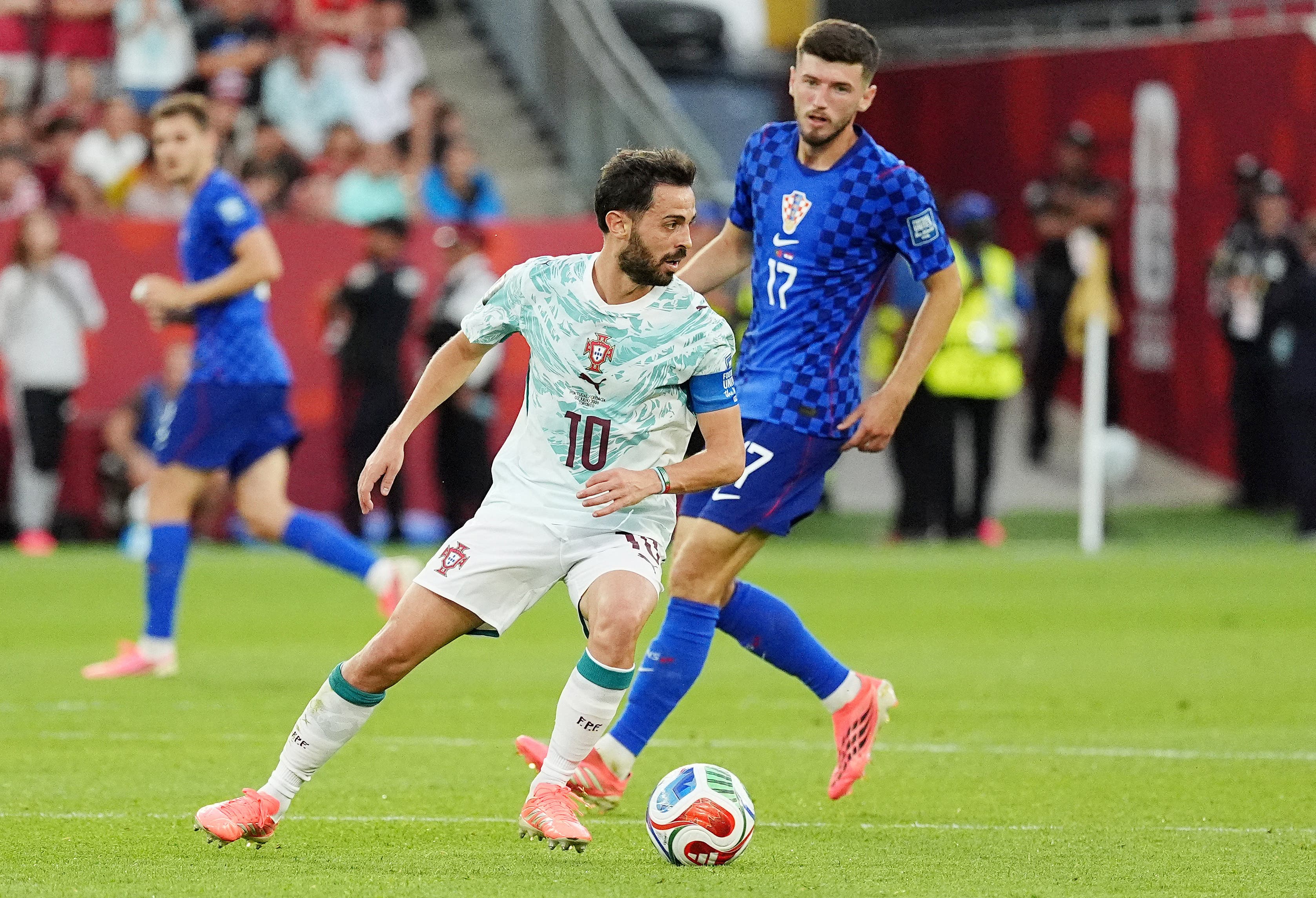 Soccer Football - FIFA World Cup 2026 - Round of 32 - Portugal v Croatia - Toronto Stadium, Toronto, Canada - July 2, 2026 Portugal's Bernardo Silva in action with Croatia's Petar Sucic IMAGN IMAGES via Reuters/John E Sokolowski

