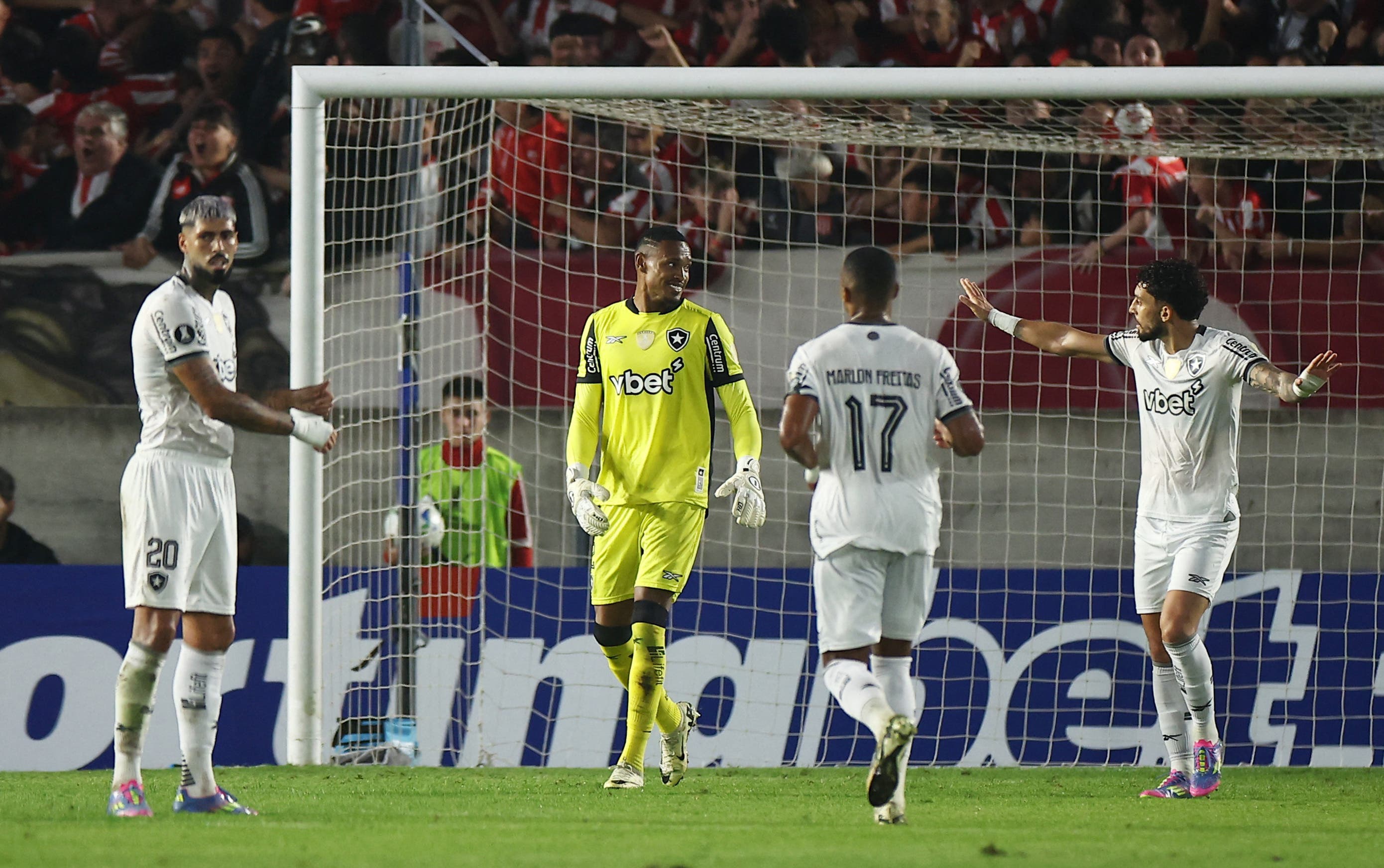 Botafogo players react after Estudiantes La Plata's Guido Carrillo scored their first goal