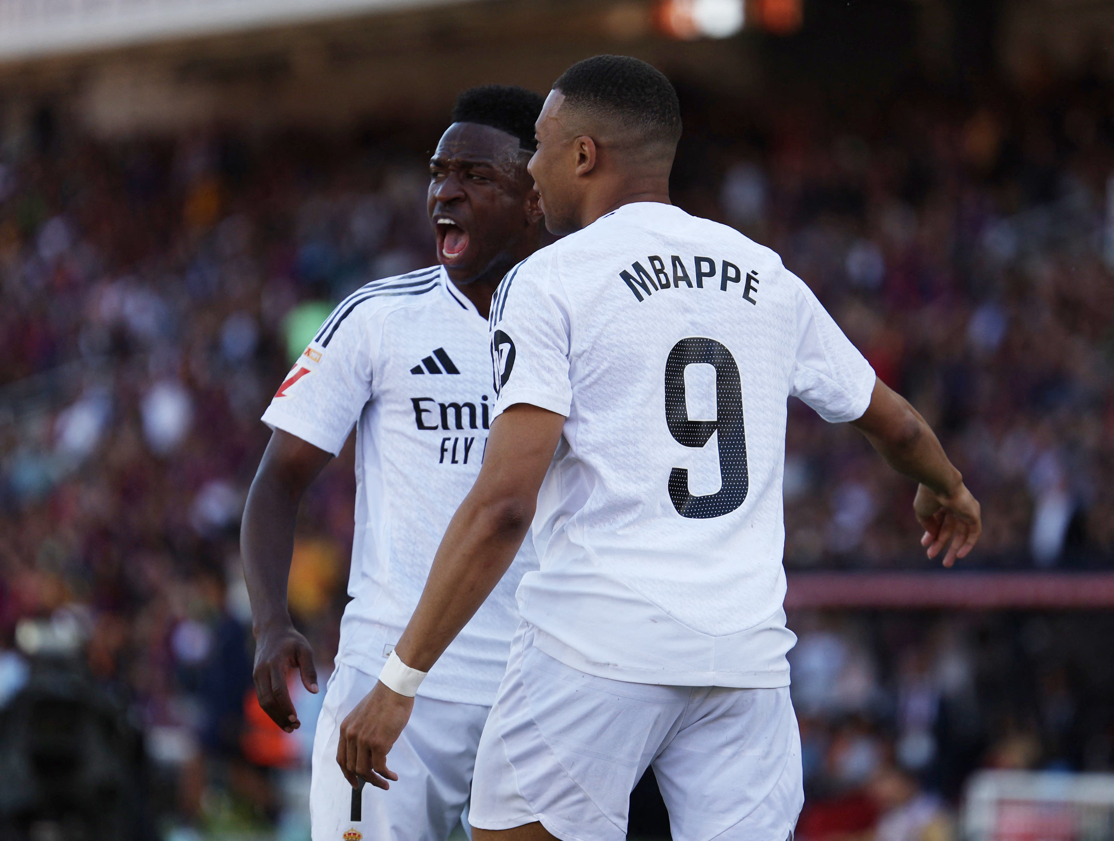 Soccer Football - LaLiga - FC Barcelona v Real Madrid - Estadi Olimpic Lluis Companys, Barcelona, Spain - May 11, 2025 Real Madrid's Kylian Mbappe celebrates scoring their first goal with Vinicius Junior REUTERS/Nacho Doce