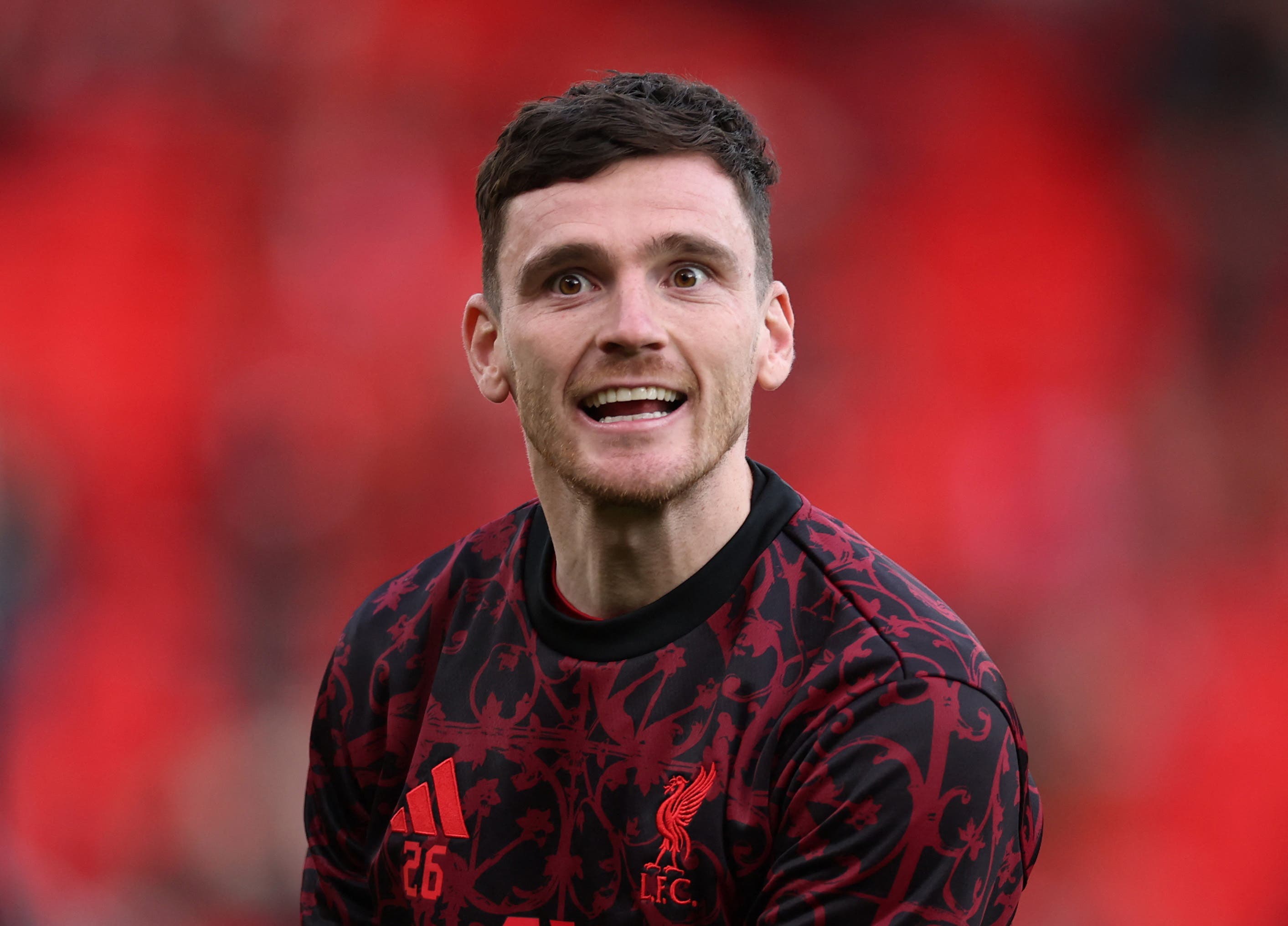 Soccer Football - Premier League - Liverpool v Brighton & Hove Albion - Anfield, Liverpool, Britain - December 13, 2025 Liverpool's Andy Robertson during the warm up before the match REUTERS/Phil Noble