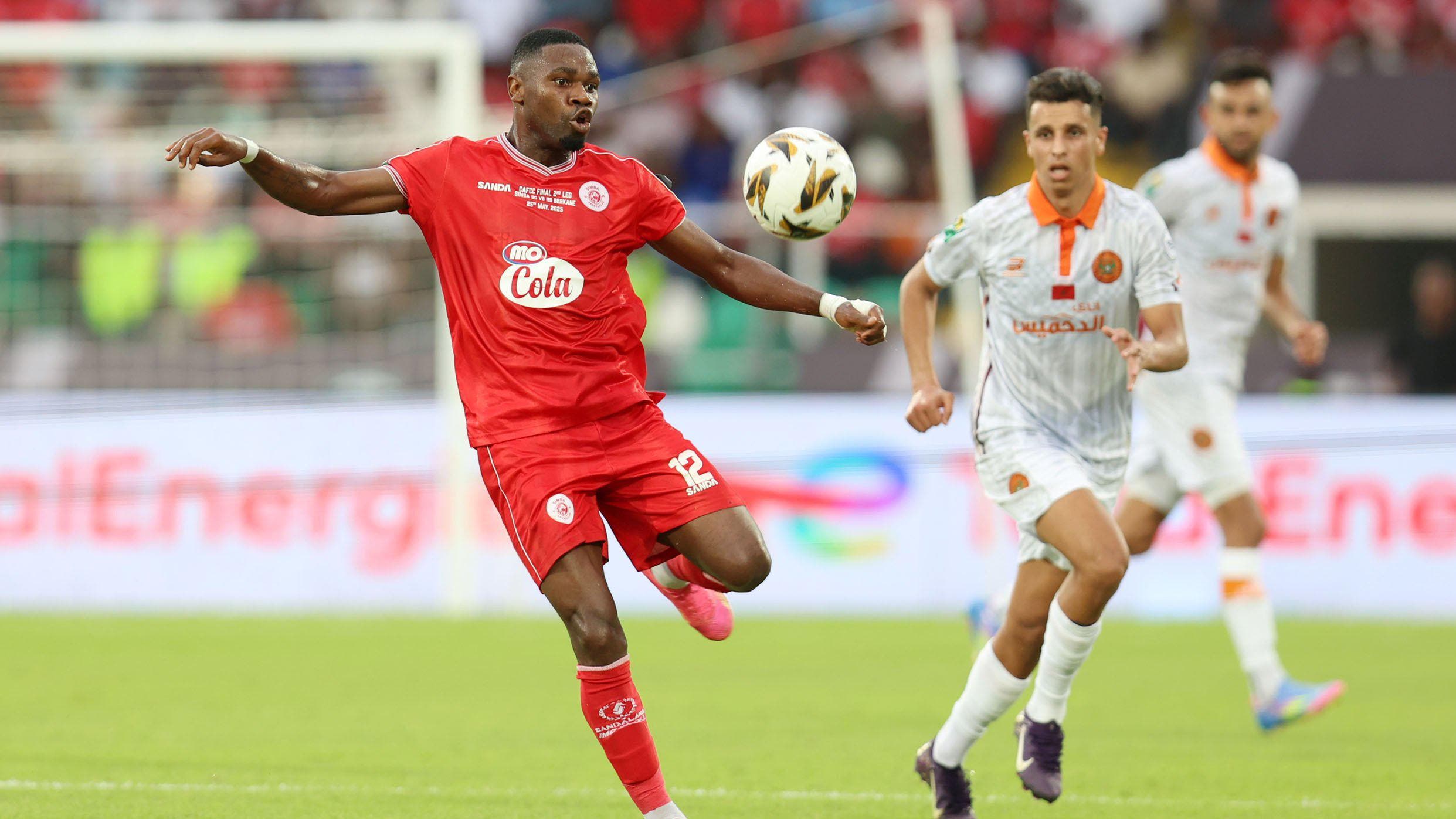 Simba SC and RS Berkane player battle for the ball at the CAF Confederation Cup Final