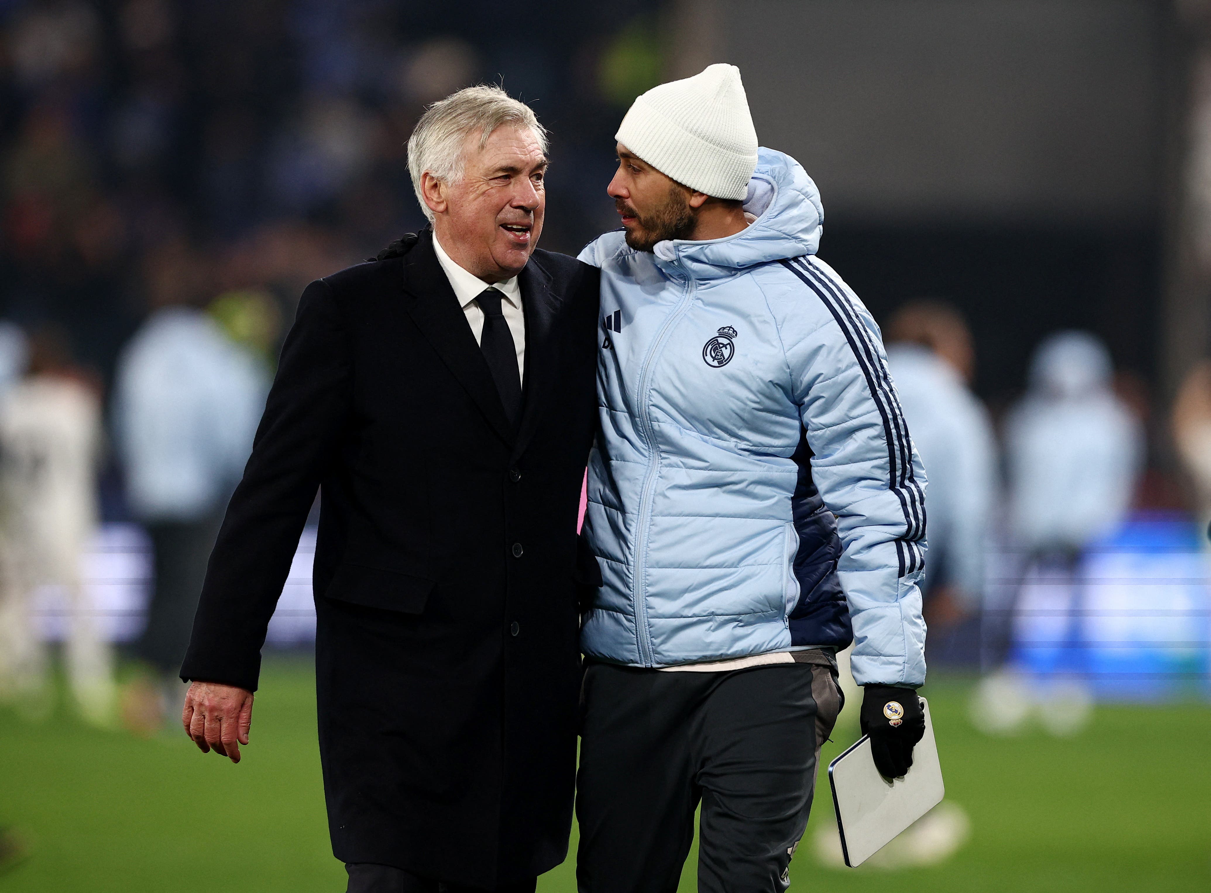 Real Madrid coach Carlo Ancelotti celebrates with assistant manager Davide Ancelotti 