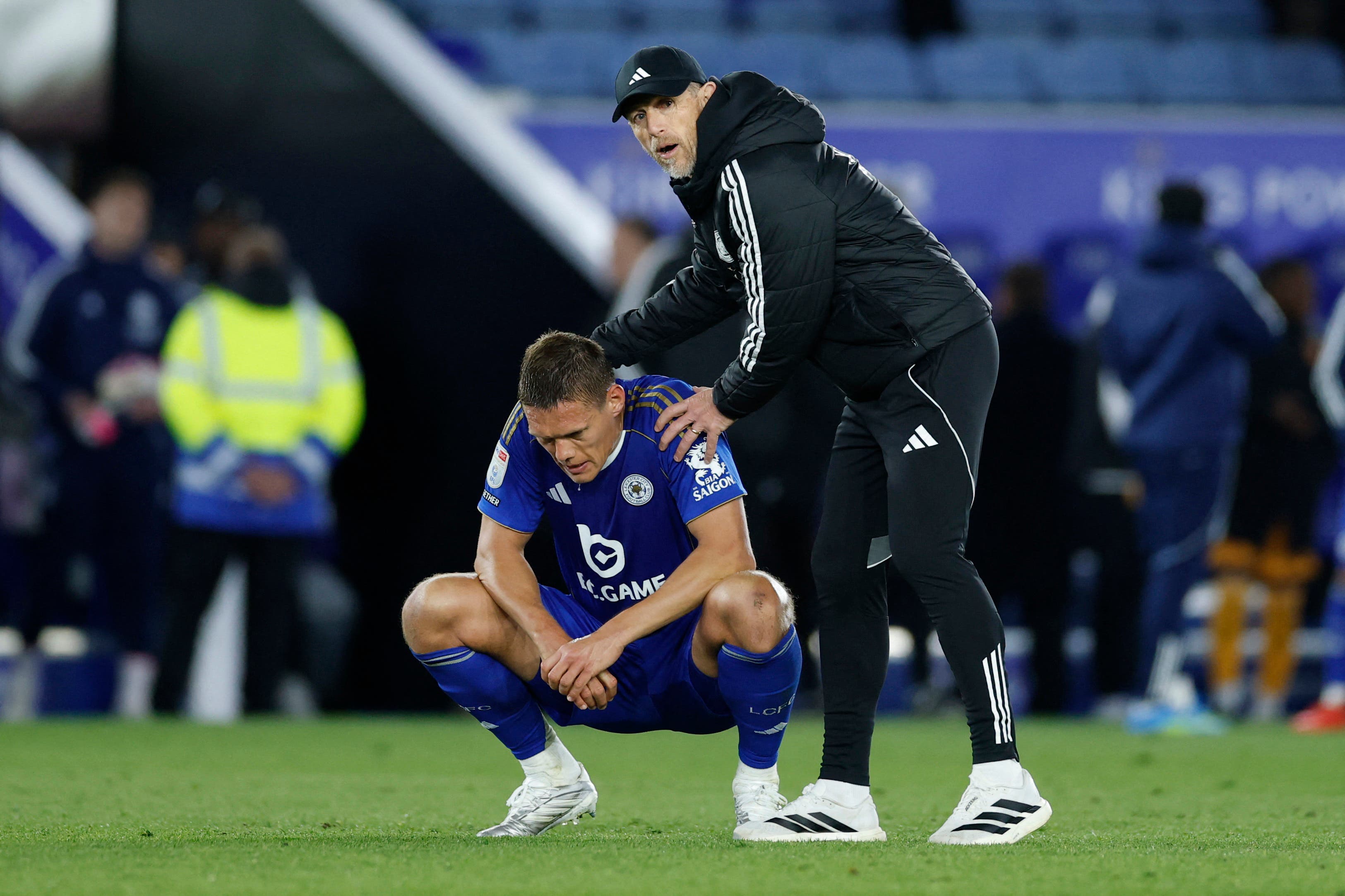 Soccer Football - Championship - Leicester City v Hull City - King Power Stadium, Leicester, Britain - April 21, 2026 Leicester City manager Gary Rowett and Jannik Vestergaard look dejected after the match as they are relegated to League One Action Images/Peter Cziborra