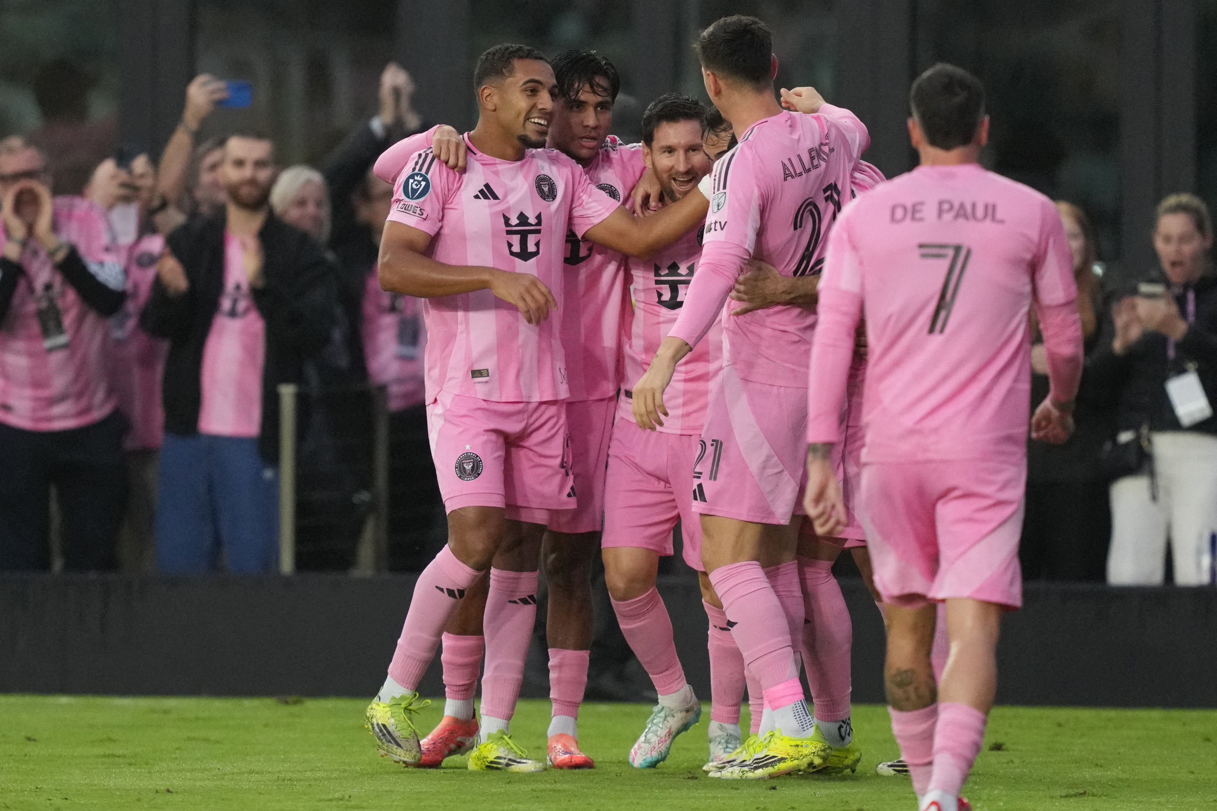 Mar 18, 2026; Fort Lauderdale, Florida, USA; Inter Miami forward Lionel Messi, center, celebrates scoring a goal against Nashville SC during the first half at Chase Stadium. The goal was the 900th of Messi’s career. Mandatory Credit: Jim Rassol-Imagn Images